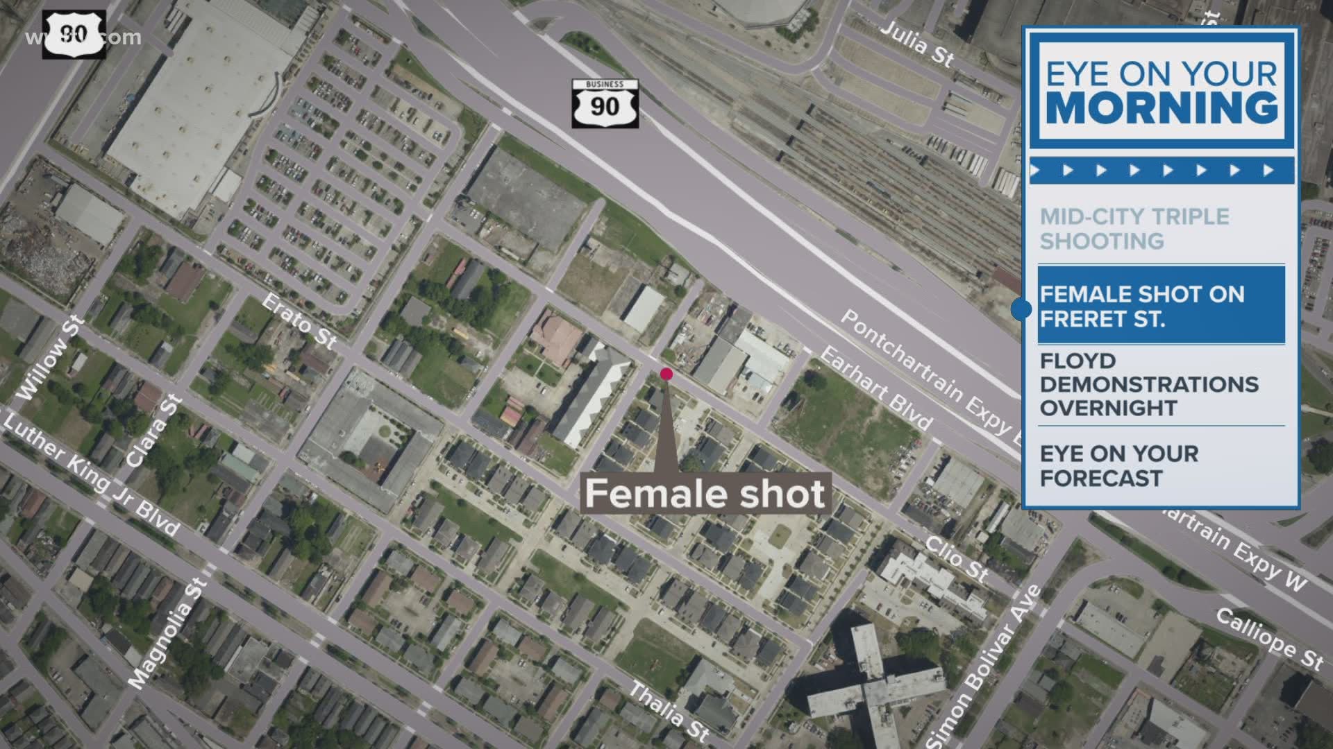 The woman was shot in the face, police officials say. Her condition was not immediately known.