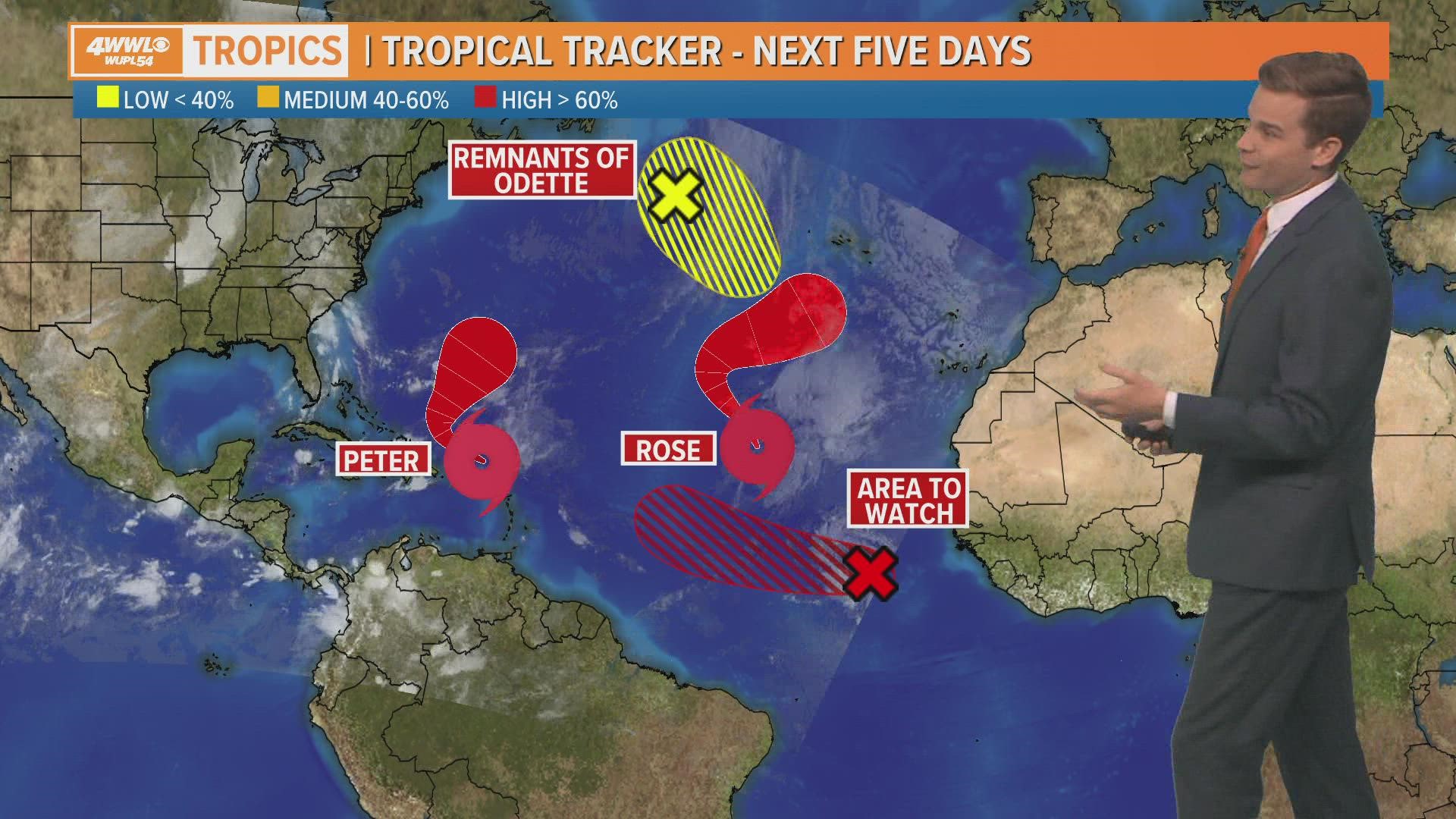 Tuesday AM Tropical Update: Invest 98-L's early paths curve back to Atlantic