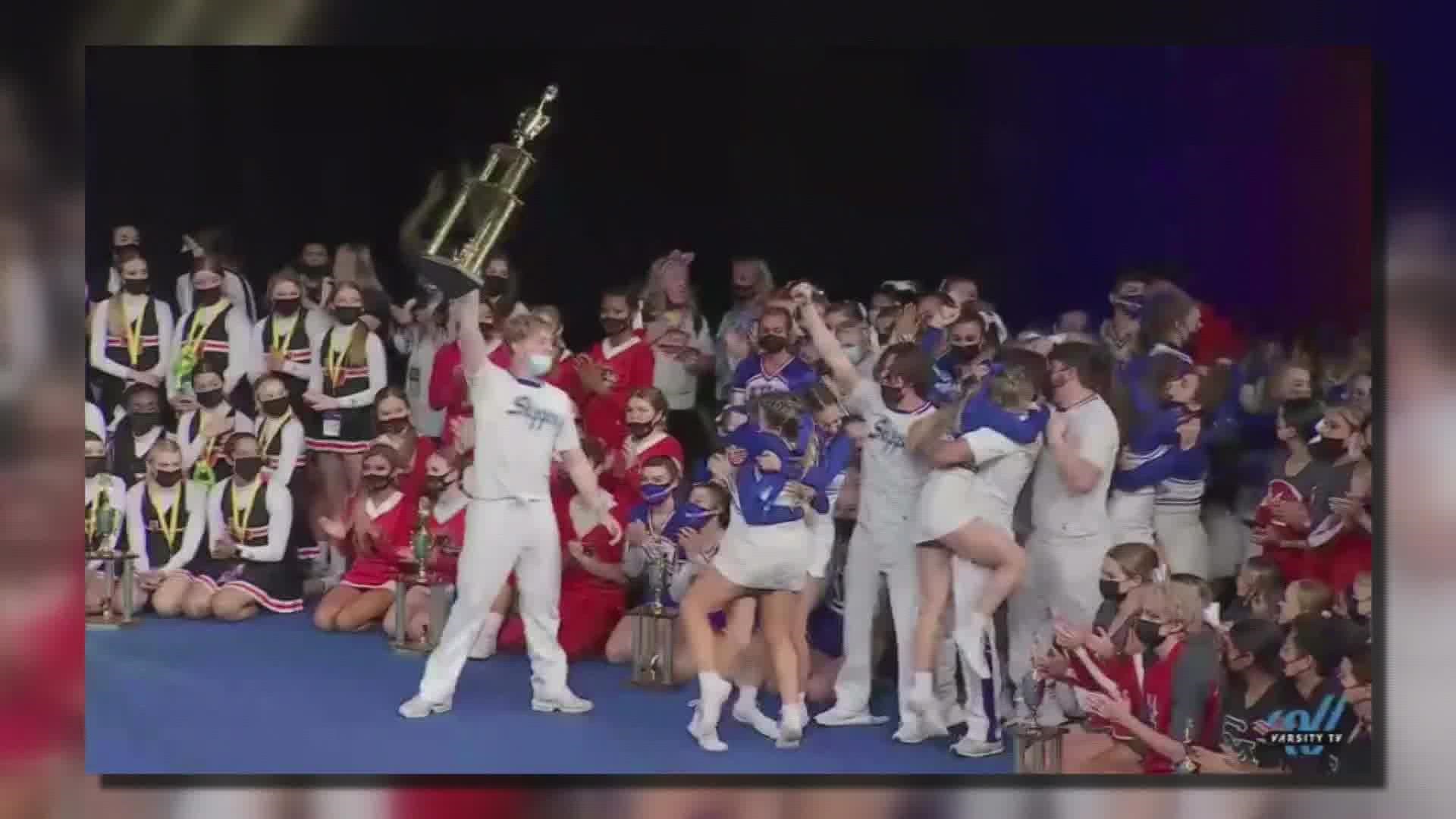 33 Mandeville students are on the team that won at the UCA National Cheer High School Competetion.