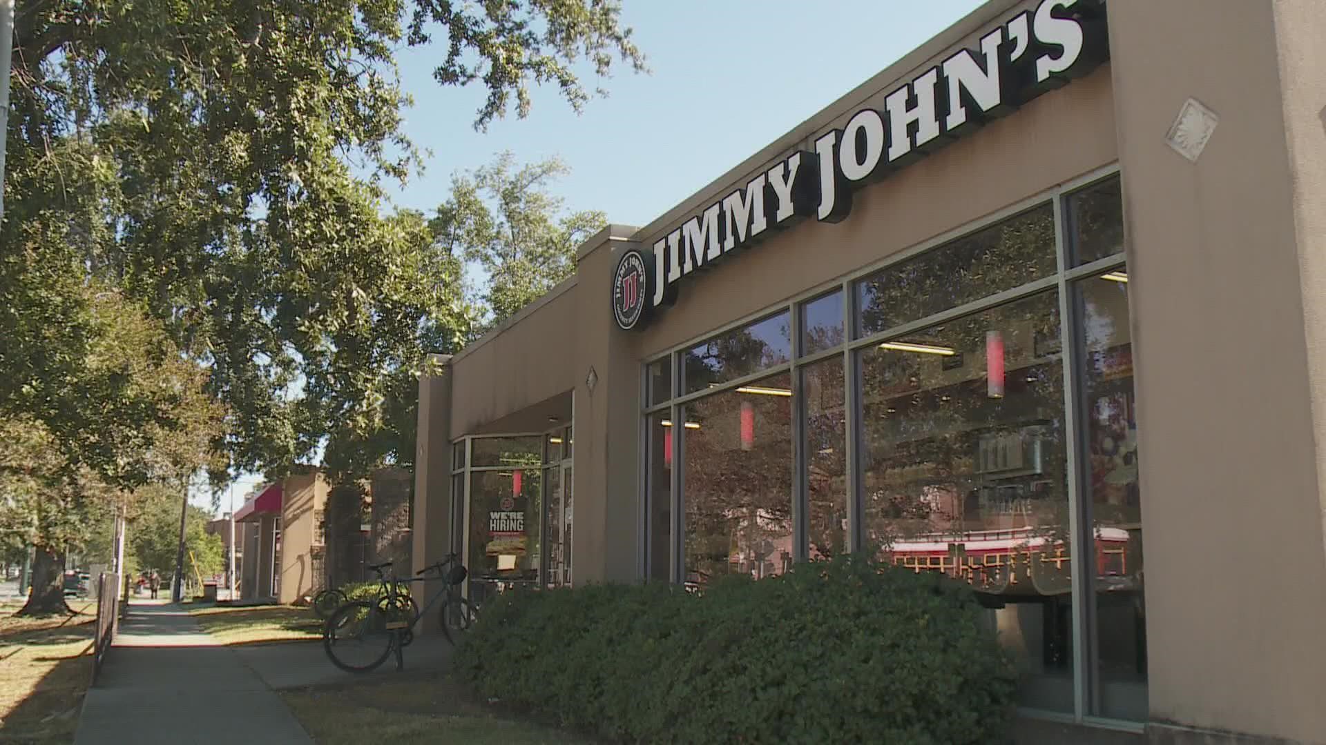 A sign outside a local Jimmy John's said the restaurant is cutting its hours as a result of “recent events that have affected our staff.”