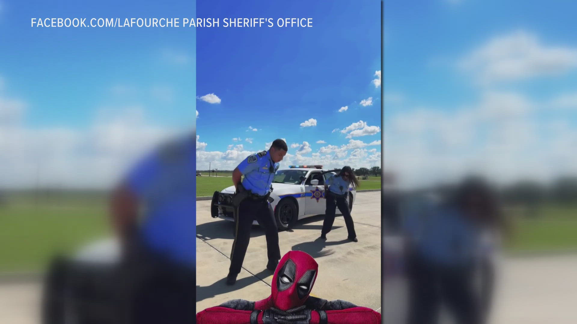 Lafourche Parish Sheriff's deputies show Deadpool their dance moves.