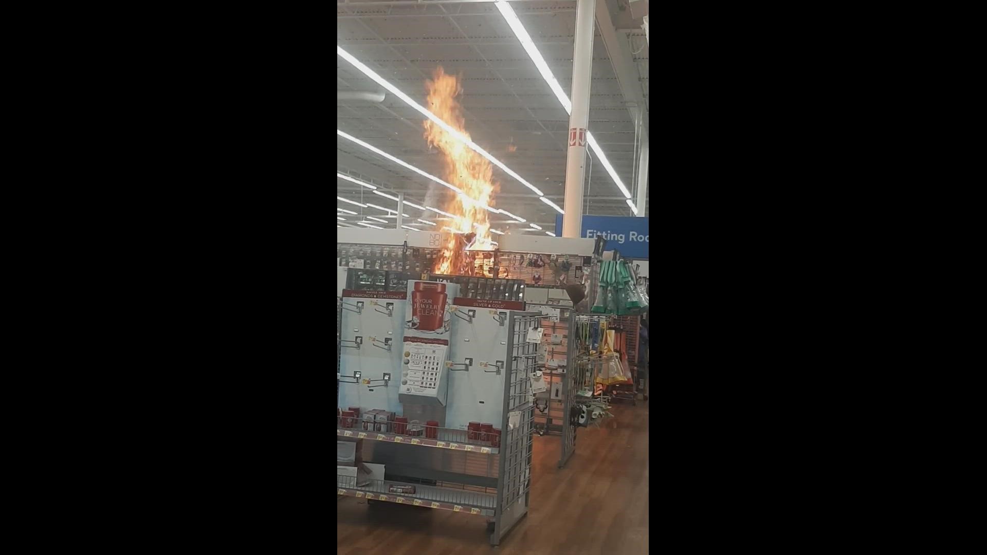 Video of the fire, posted on social media shows flames shooting out of what appears to be a clothing display.