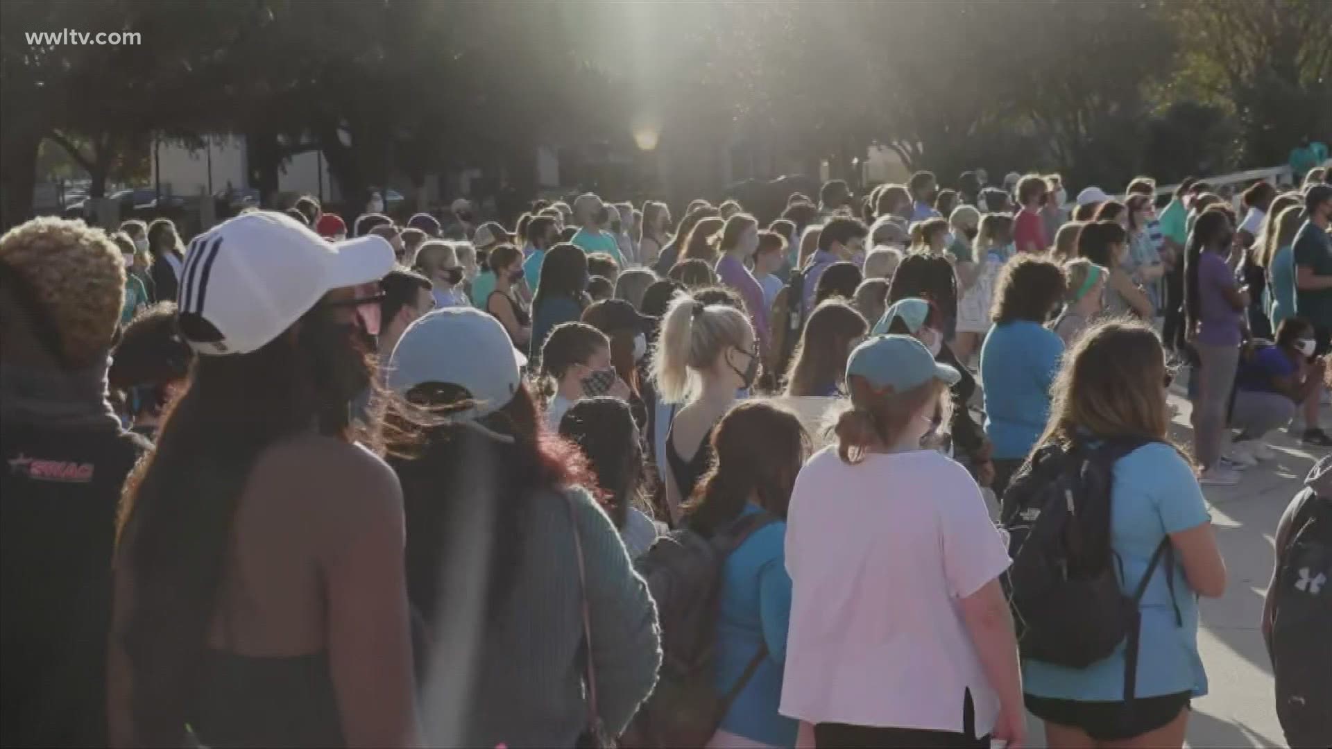 A few hundred students walked across campus in protest after an article earlier this week said LSU didn't do enough to investigate accusations of sexual assault.