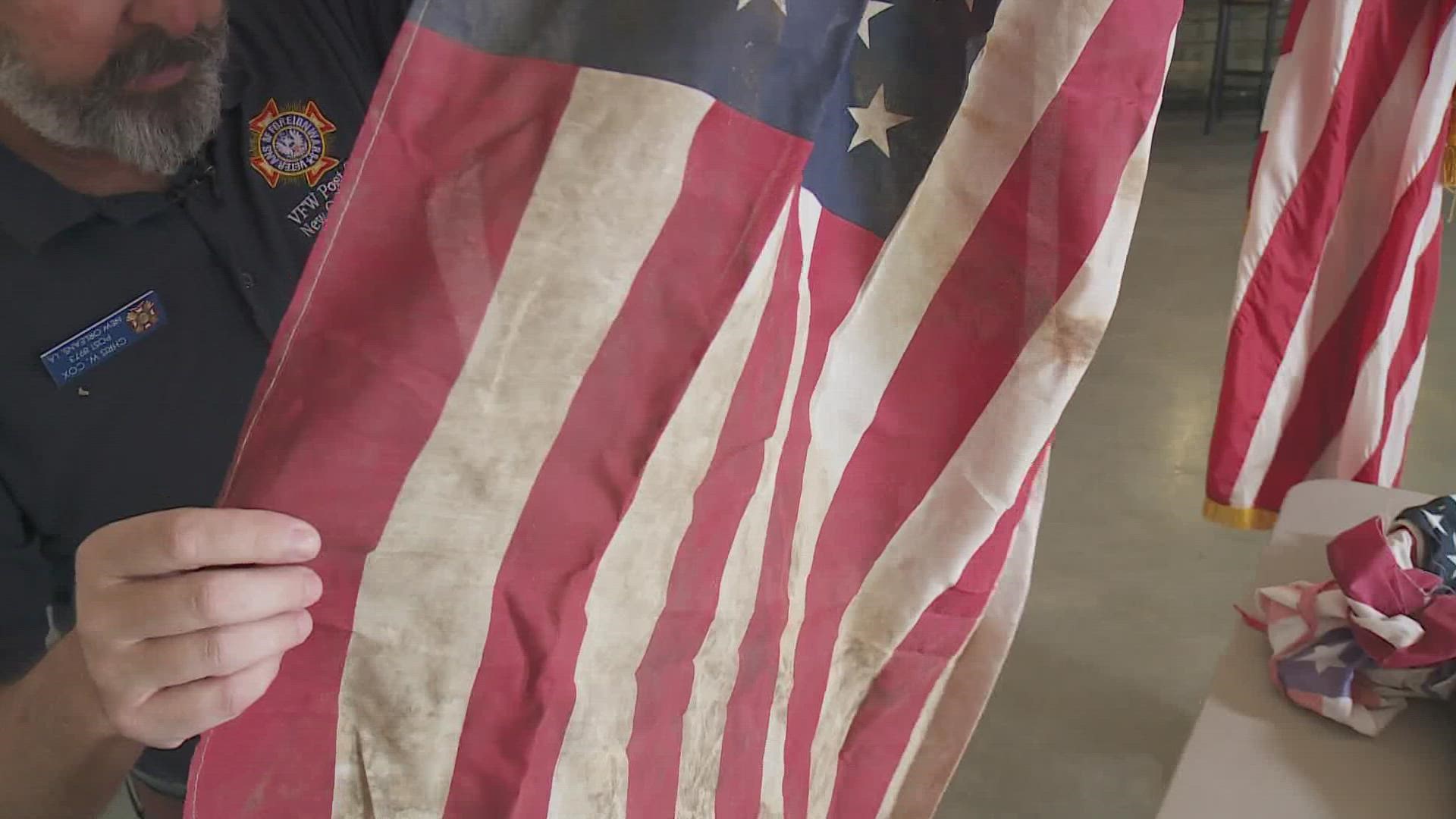 Louisiana veterans honoring American Flag with traditional retirement ...