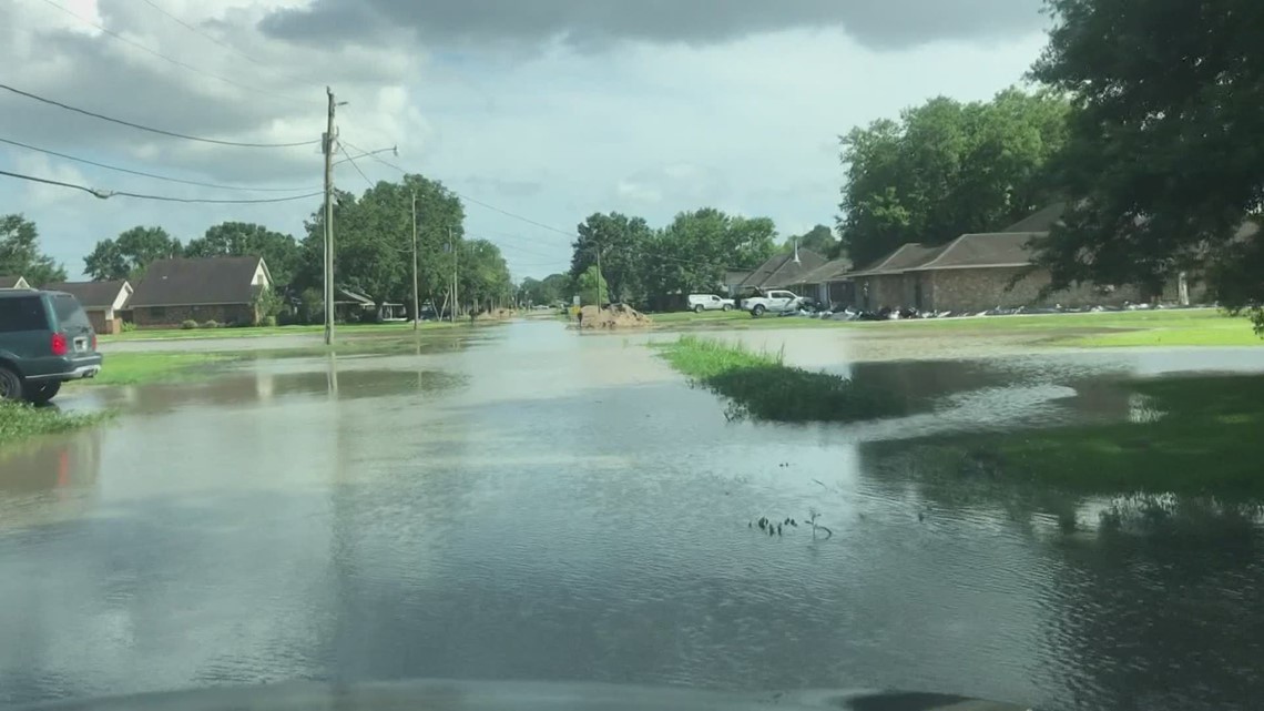 St. James Parish residents try to keep above water as flooding ...