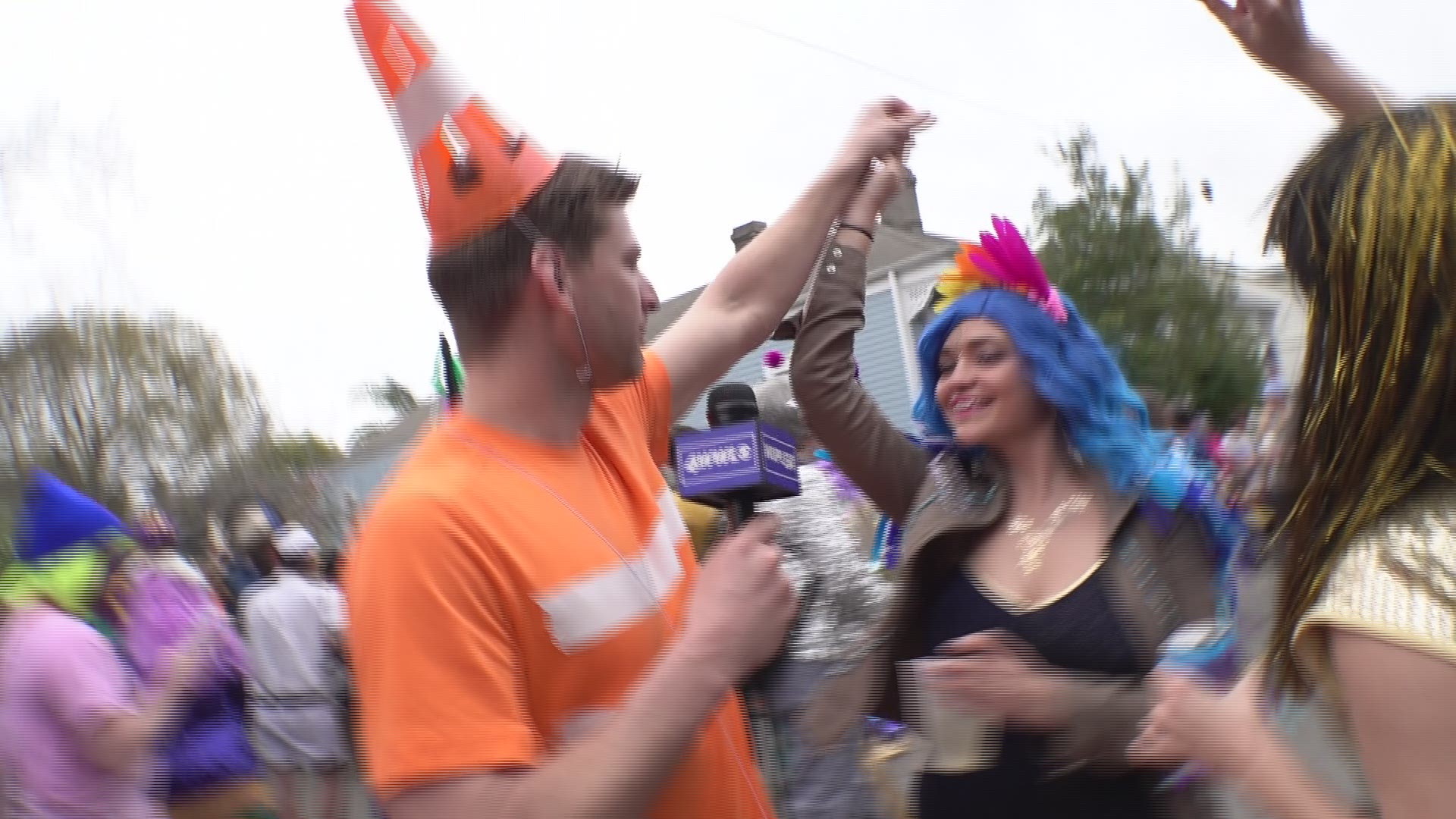 WWLTV's Paul Dudley and Devin Bartolotta celebrated with Mardi Gras goers in the Marigny area in New Orleans.