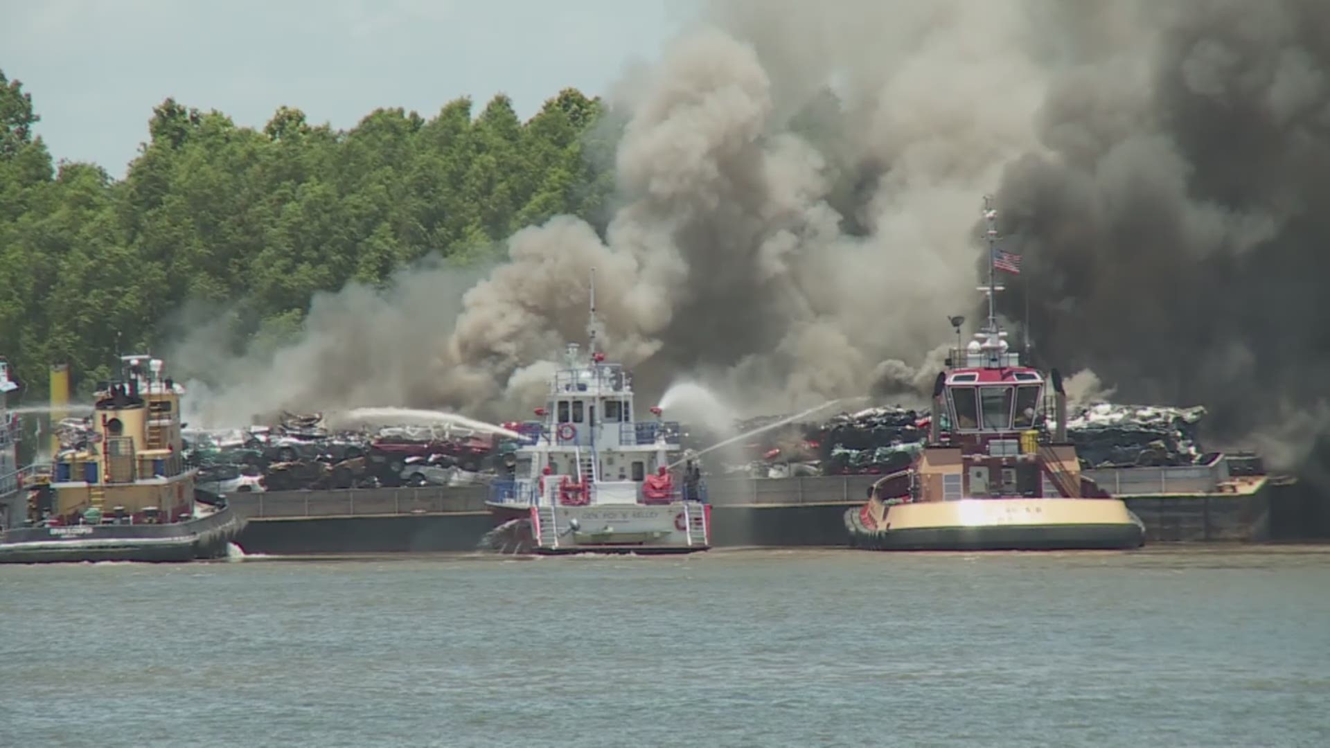 Raw footage shows tugboats helping to put out a barge fire on the Mississippi River in Jefferson Parish