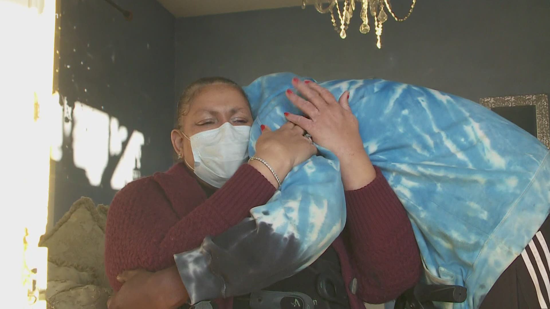 The community came together for a woman who lost her home to a fire possibly caused by fireworks on New Years Eve.