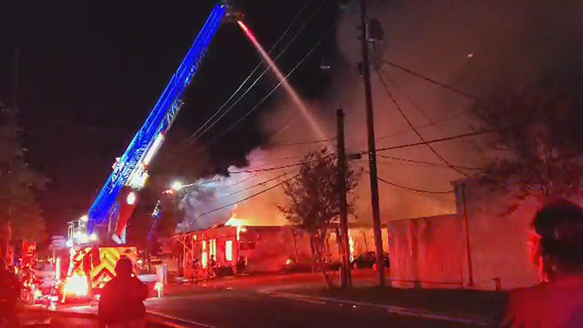 A large fire was burning in downtown Covington at the Marsolan's Feed and Seed store Monday night. Video courtesy: Cindy Schneida.