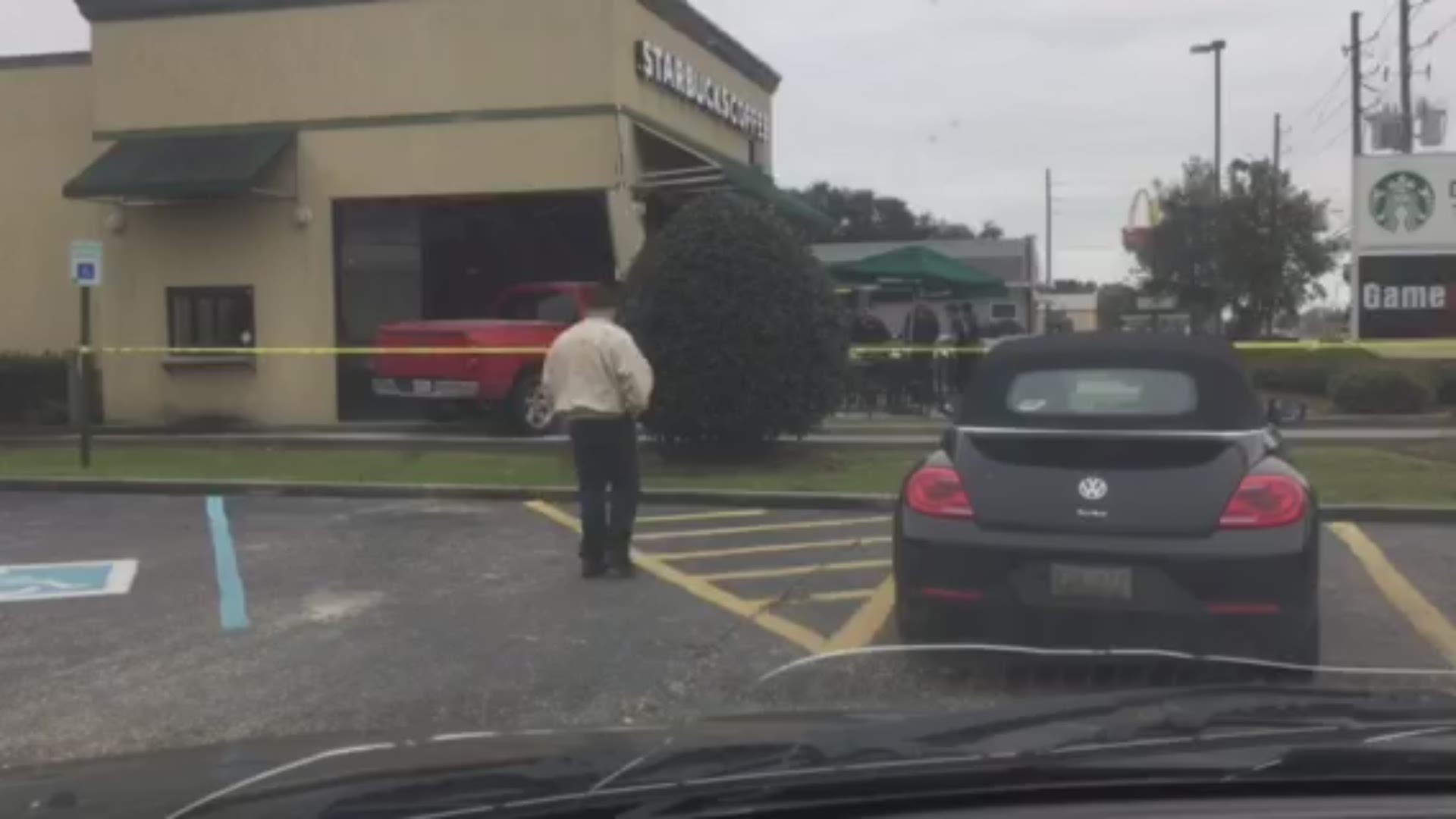 Officials say the vehicle went through a Starbucks on Barataria in Marrero.