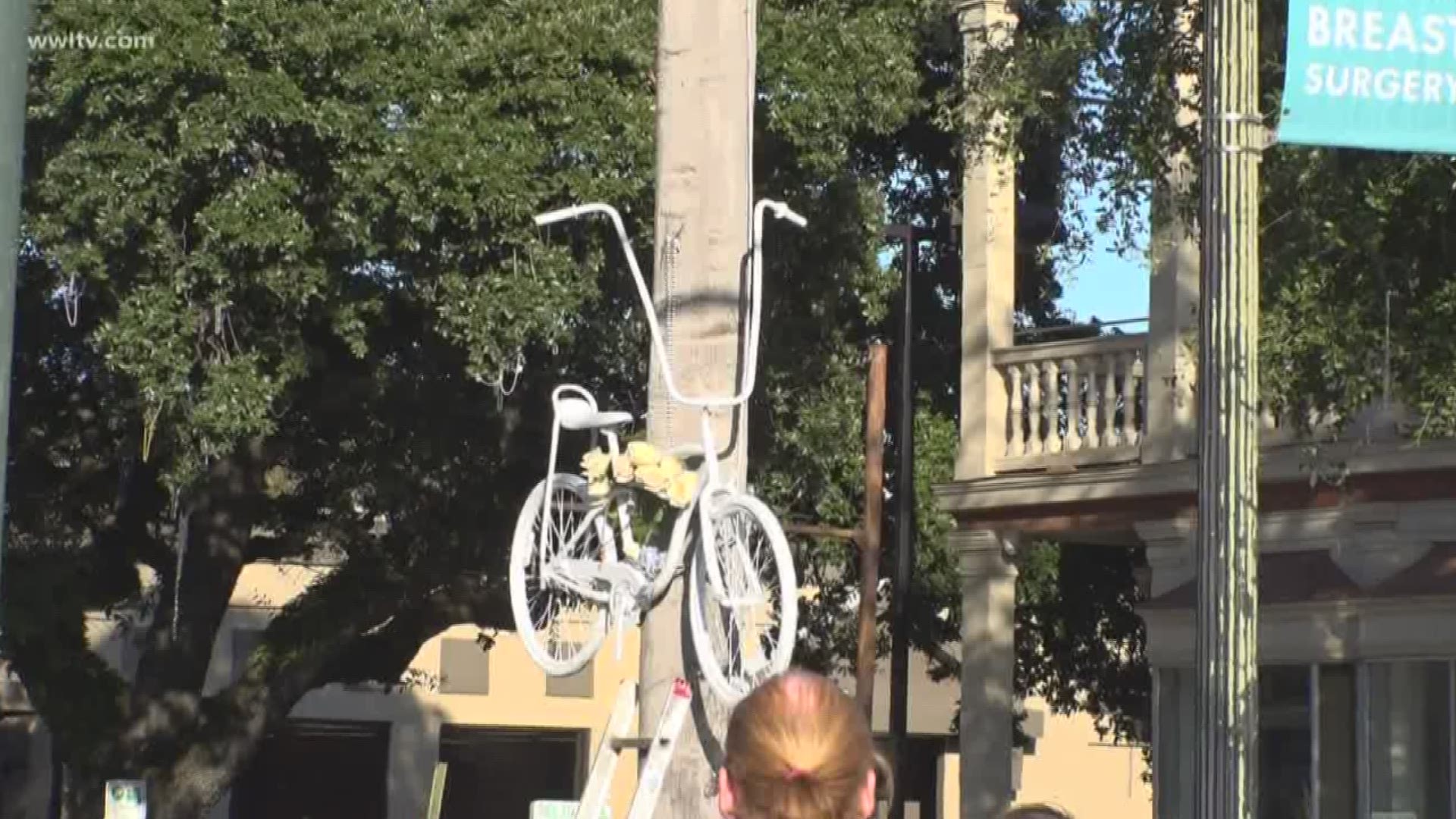 A group of bicyclists placed another 'ghost bike' on a city street to commemorate the latest death of another cyclist.