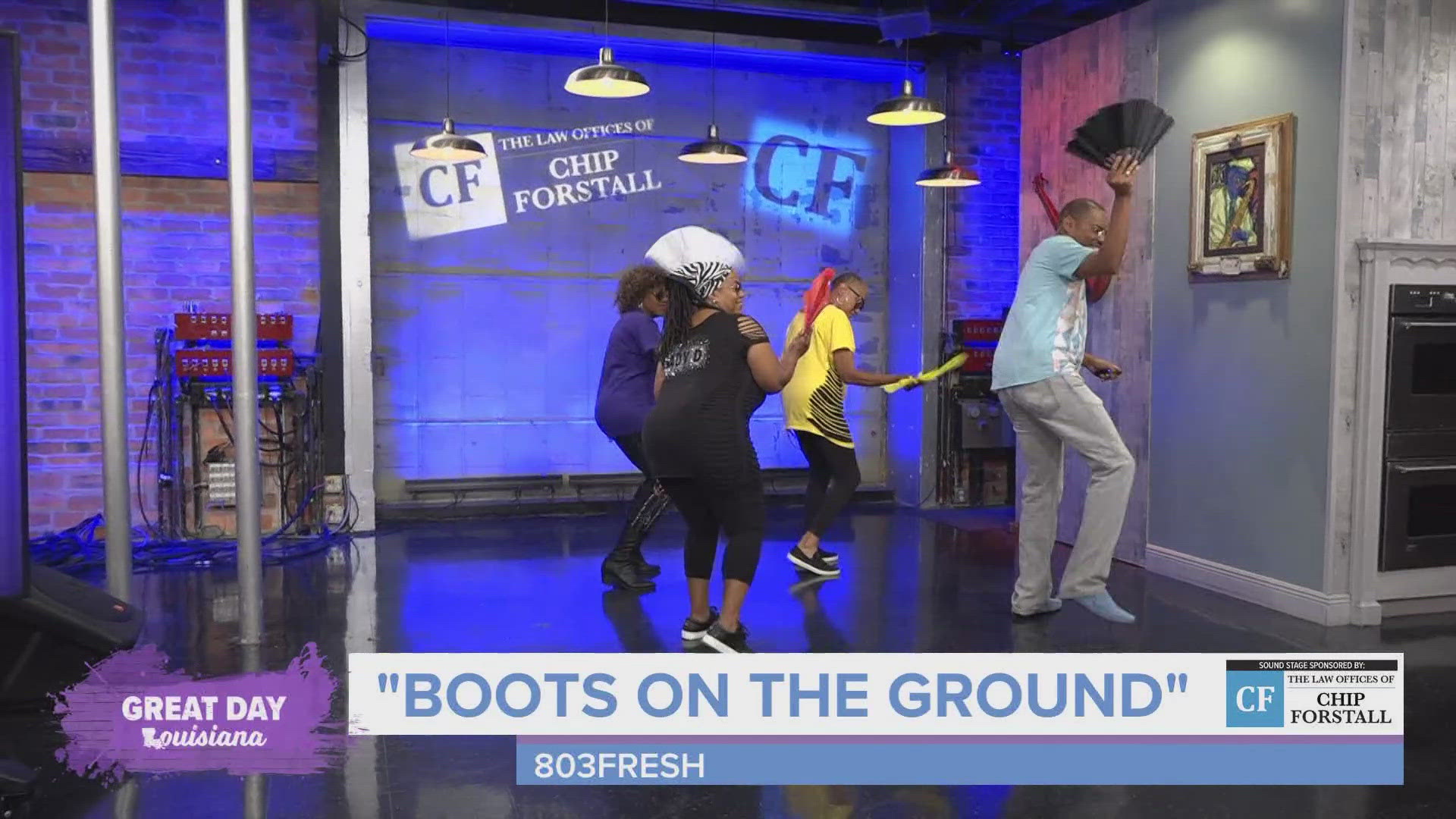 Lady D and Malik do the "Boots On The Ground" line dance!