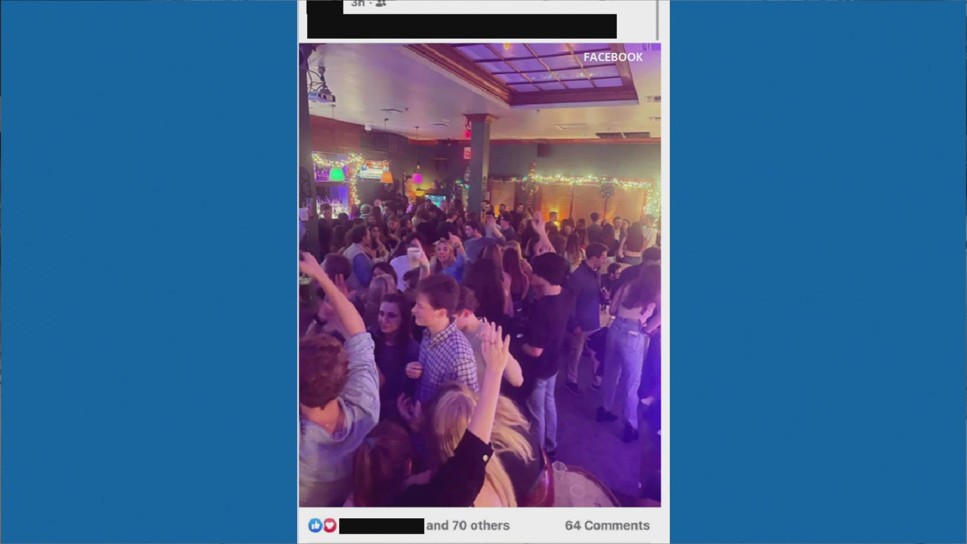 The photo shows a packed bar with no masks in sight.