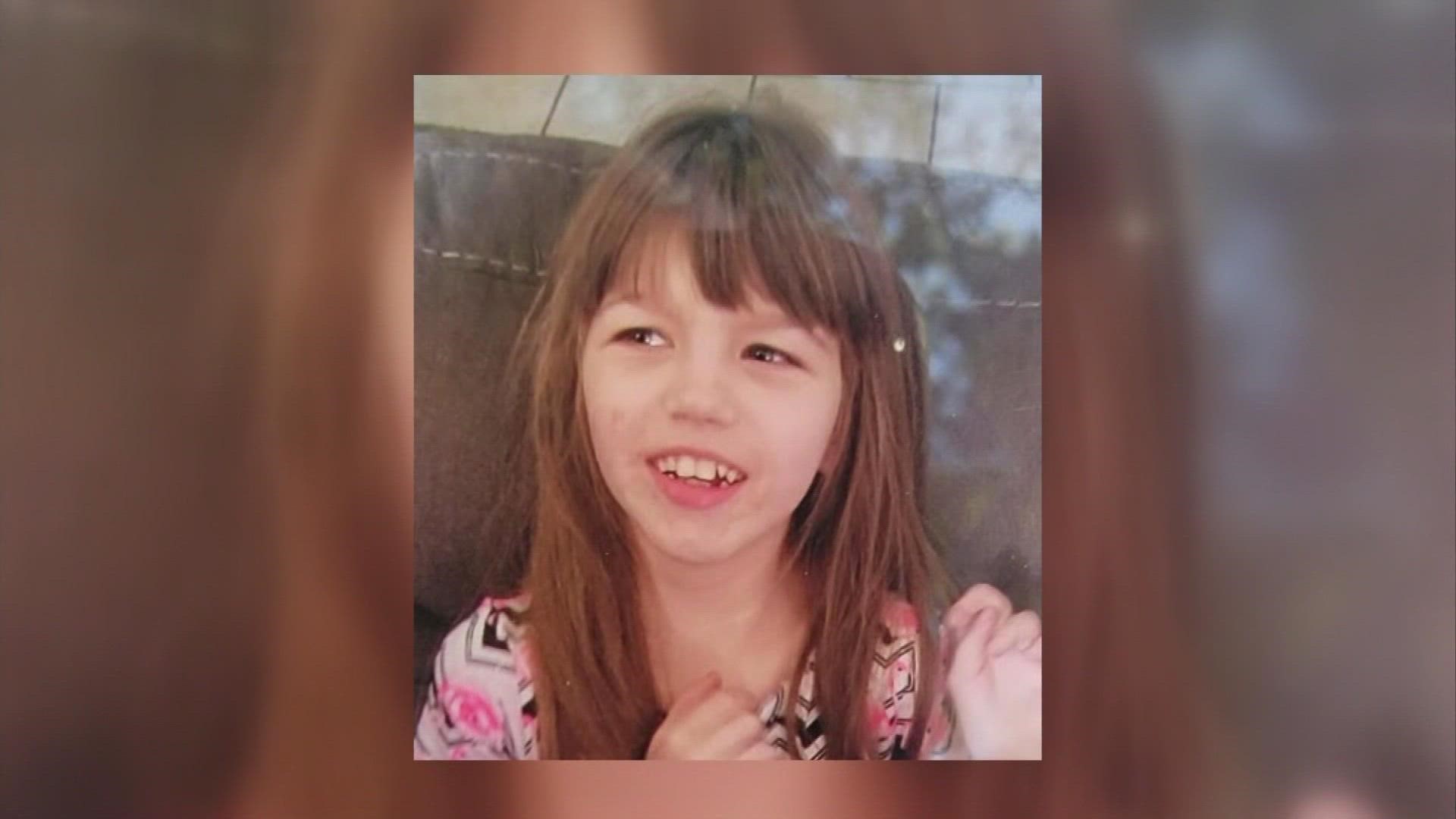 A 10-year-old girl is was found dead after apparently drowning in a pond near her home.