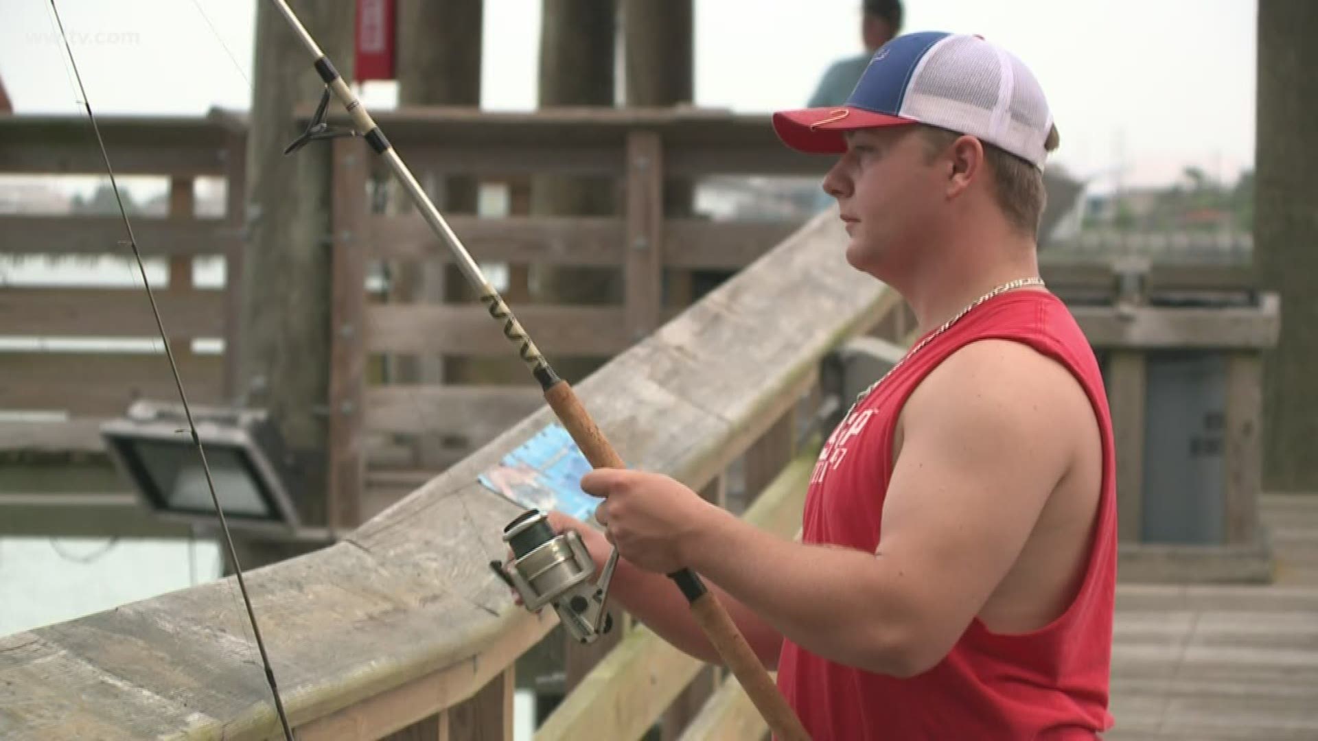 The pier had been closed since June because of the algae bloom.