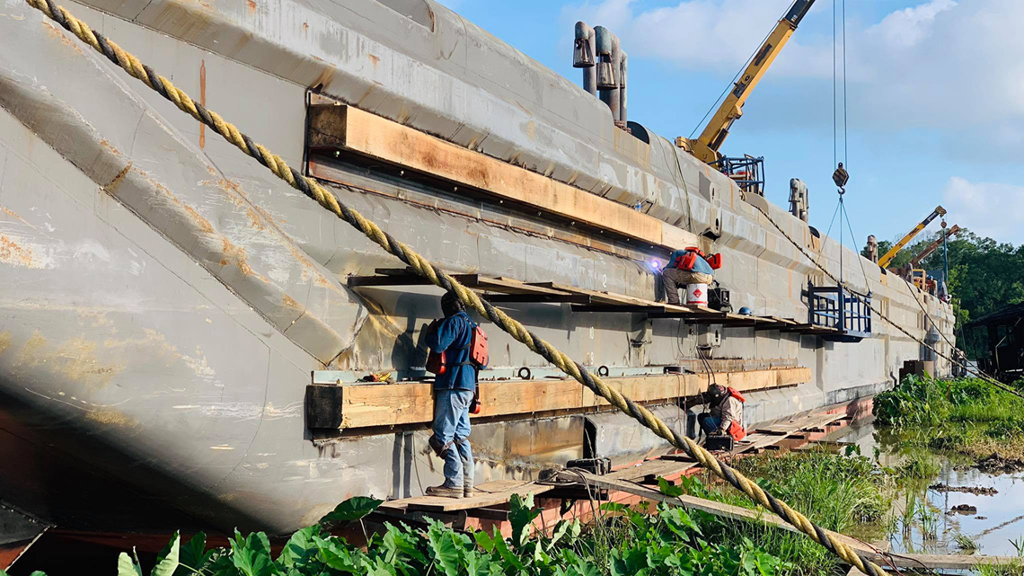 Crews race to sink barge in Bayou Chene before Morganza Spillway opens