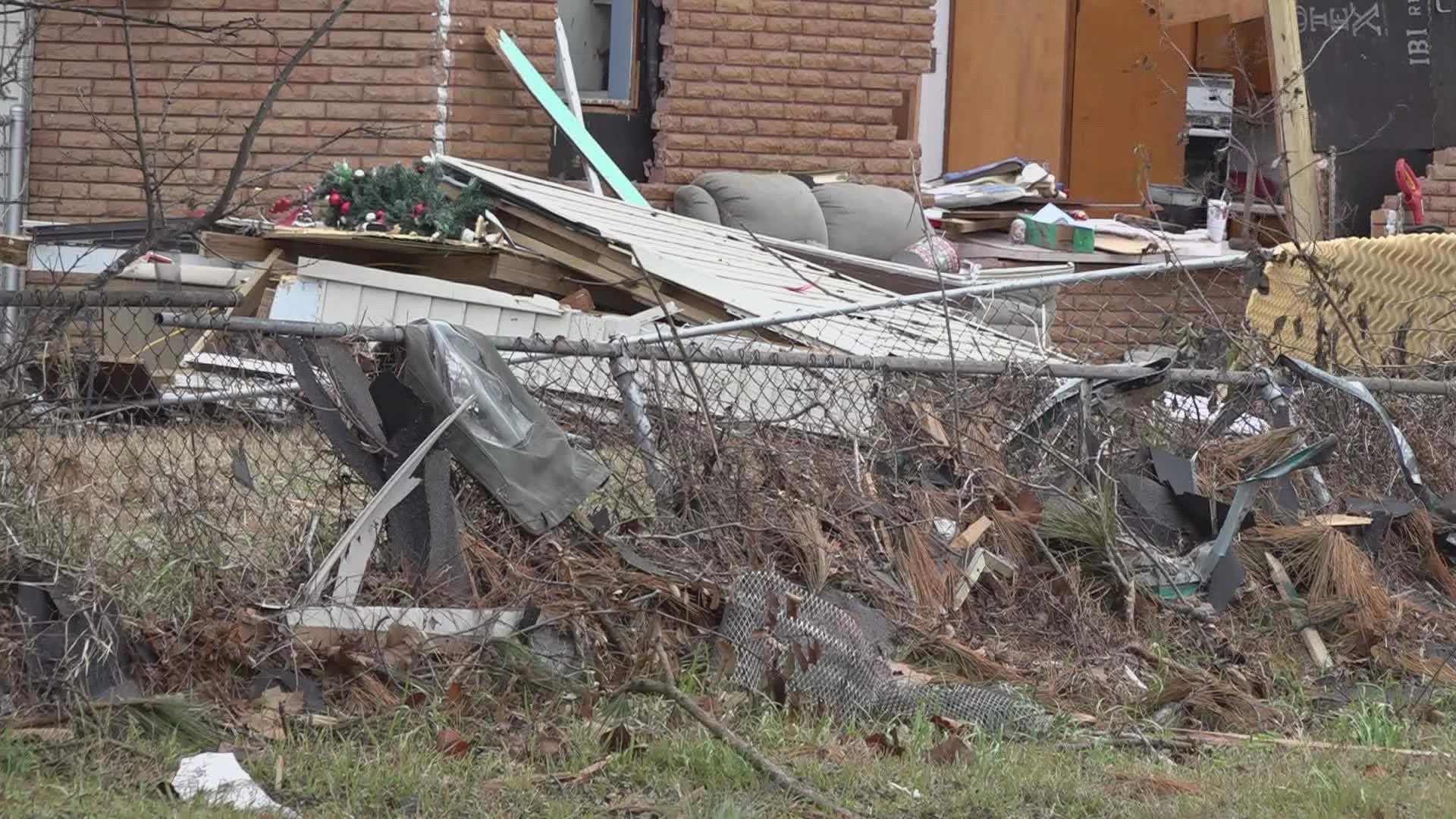 Chimento's family, along with other families in the neighborhood, were securing their tarps Monday as more strong storms with the risk of tornadoes could approach.