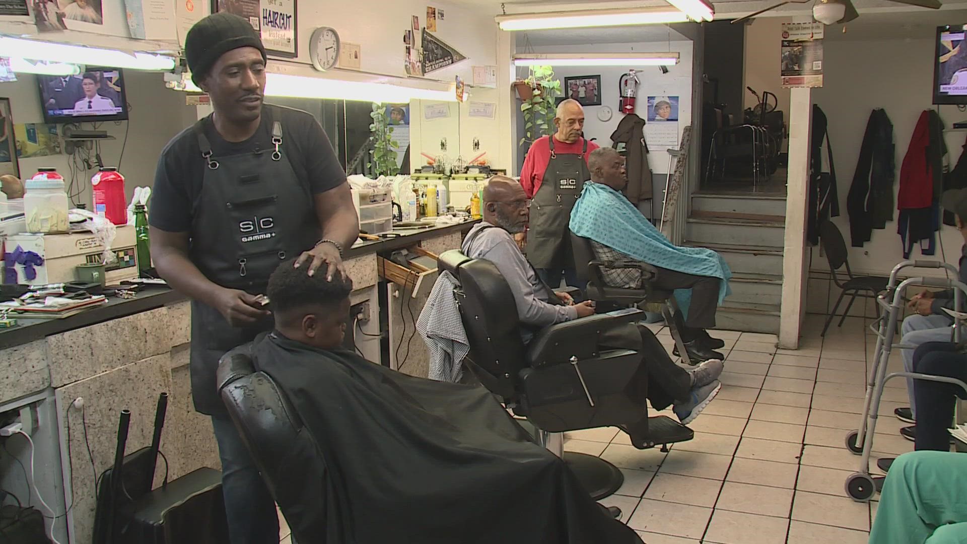 Stan Norwood is a barber at Dennis' Barber Shop on Freret. He works to mentor his young clients by offering advice and life lessons.