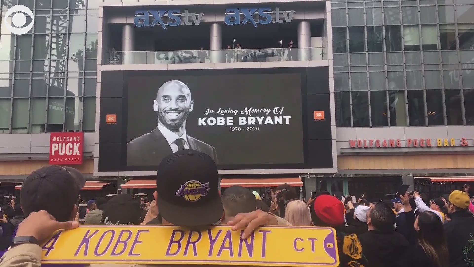 Fans chanted "Kobe, Kobe, Kobe" as they gathered near the Staples Center in LA to pay their respects to the former Lakers star.  Kobe died in helicopter crash Sunday