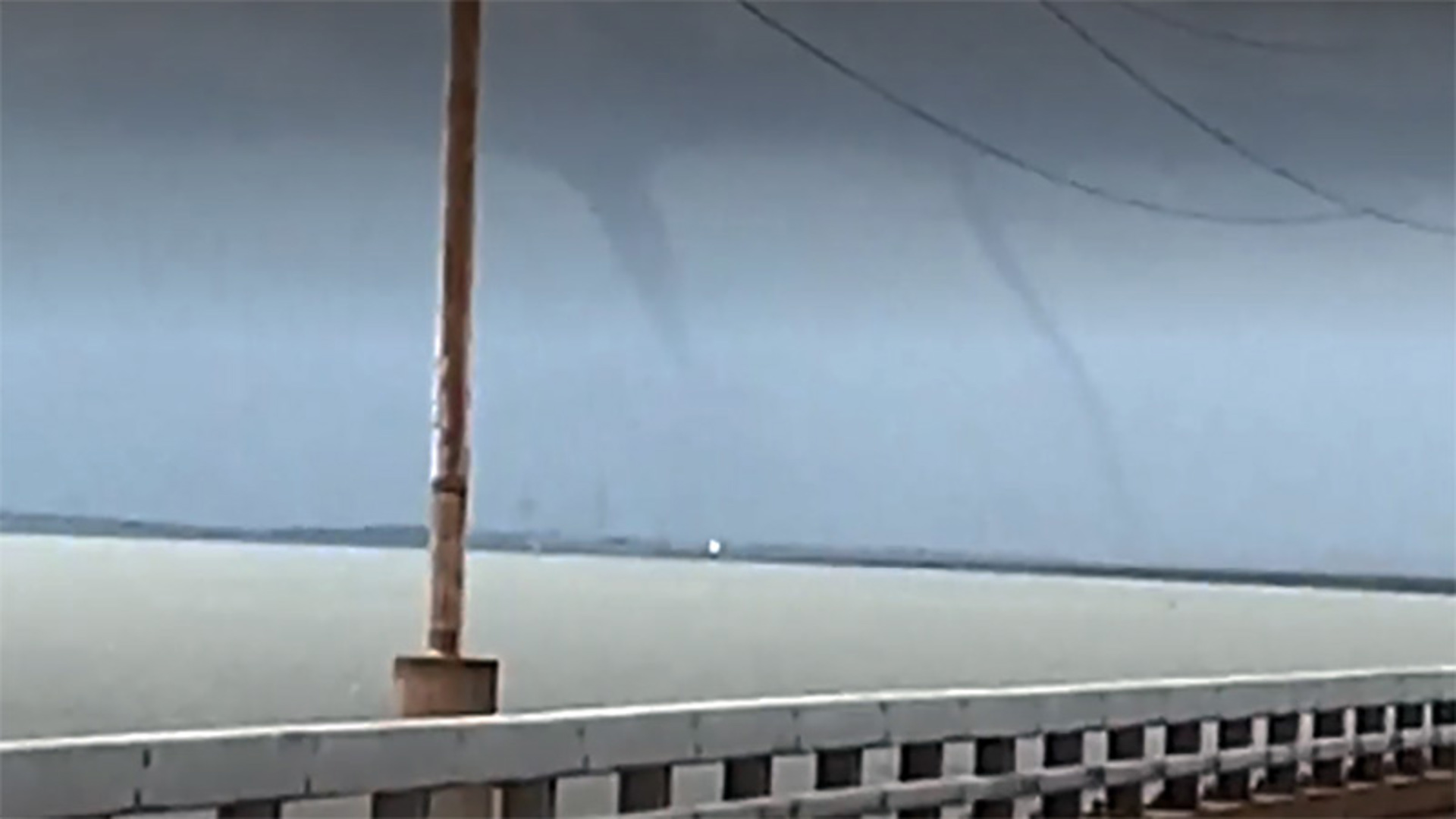 Double water spouts were spotted over Lake Pontchartrain near the Twin Spans between New Orleans and Slidell Friday morning.