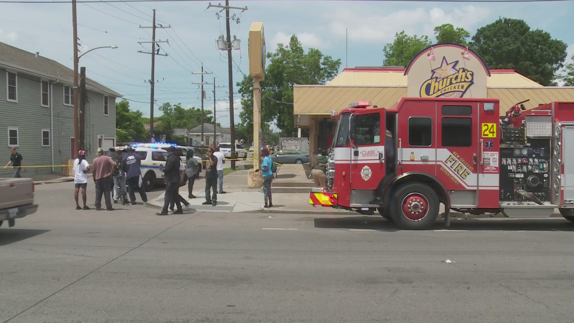 A man was shot and killed in what appears to be a hail of bullets in the parking lot of Church's Chicken Wednesday.