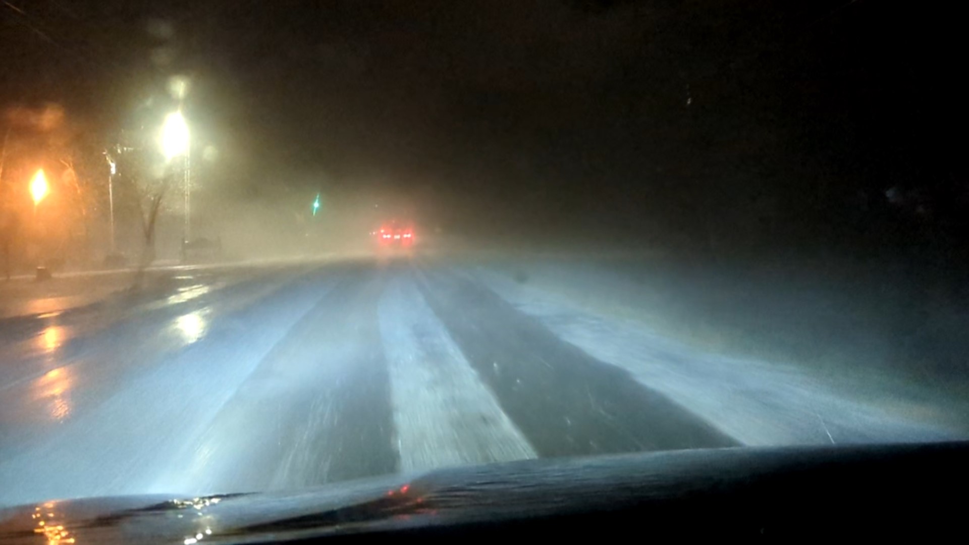 car driving in hail