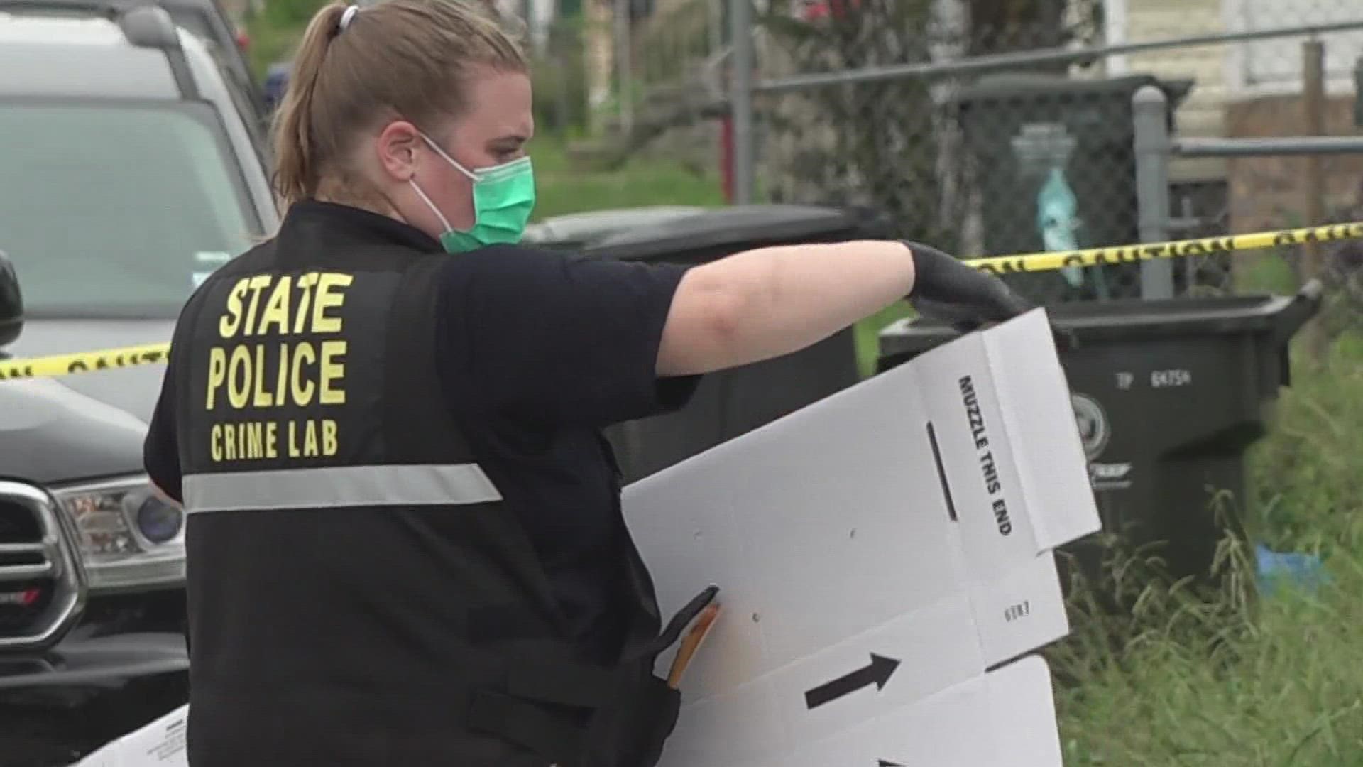 At least 36 evidence markers sat outside a home in Houma Tuesday morning after what State Police report was a shooting involving a man and police.