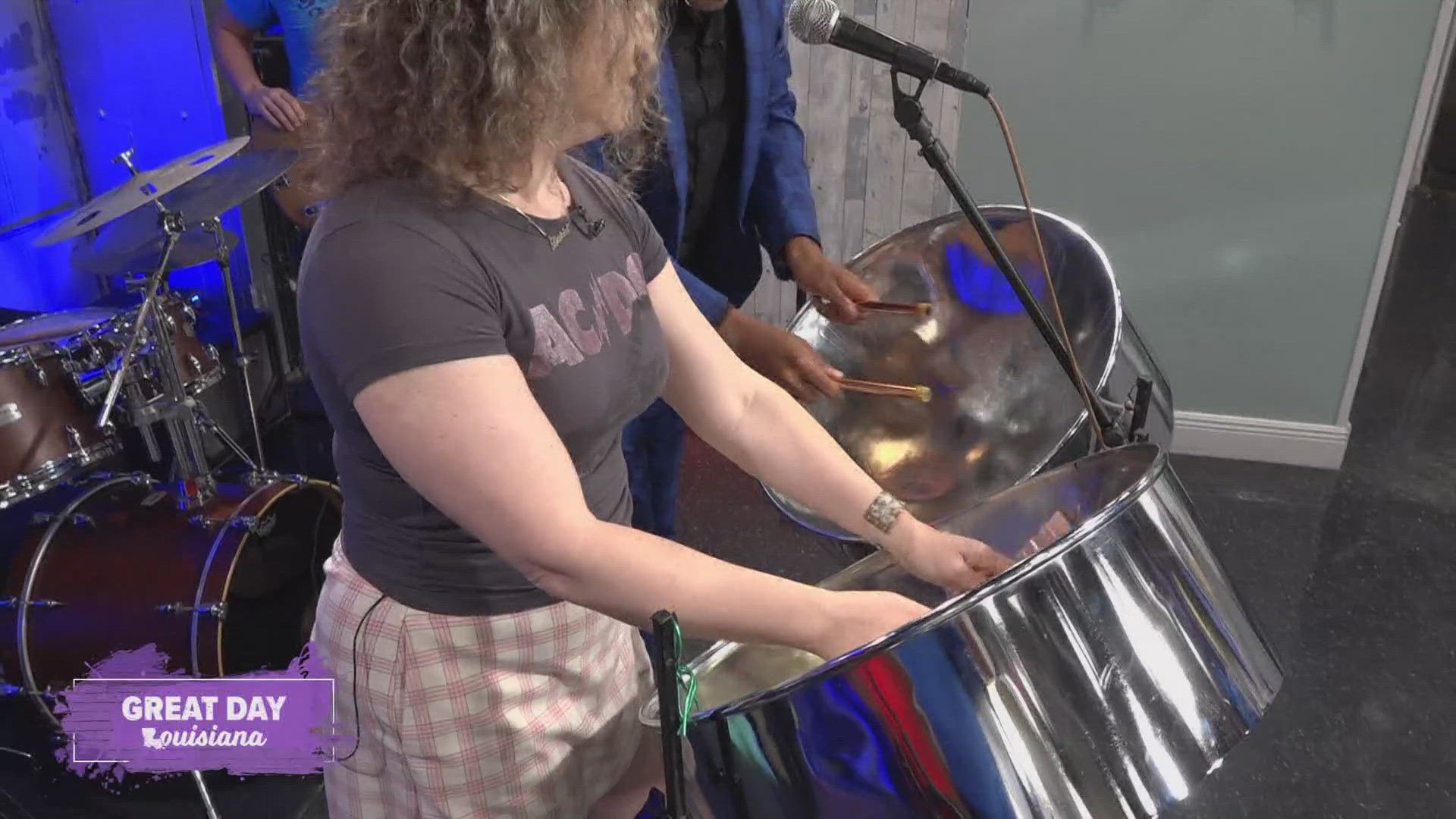 Daria Dzurik of Daria & The Hip Drops shows us how to play the steel drums and performs another song.