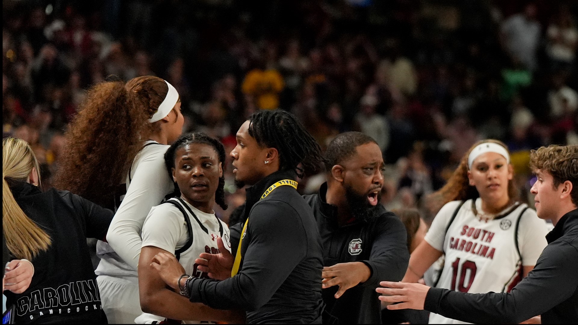 Late in the fourth quarter of the women's SEC Championship game, a fan jumped onto the court when players from LSU and South Carolina got into a scuffle.
