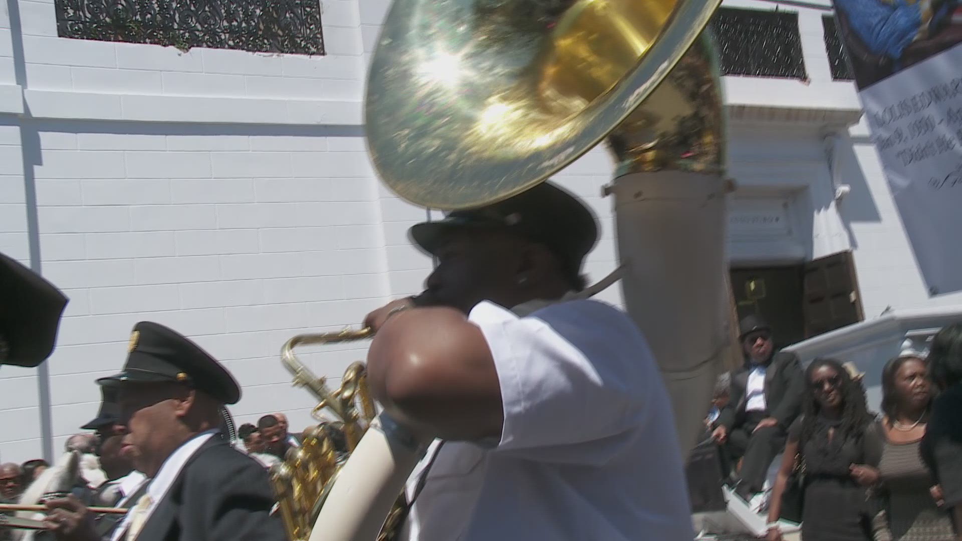 Jazz funeral procession for Lolis Edward Elie as it left St. Augustine Church in Treme on Saturday.