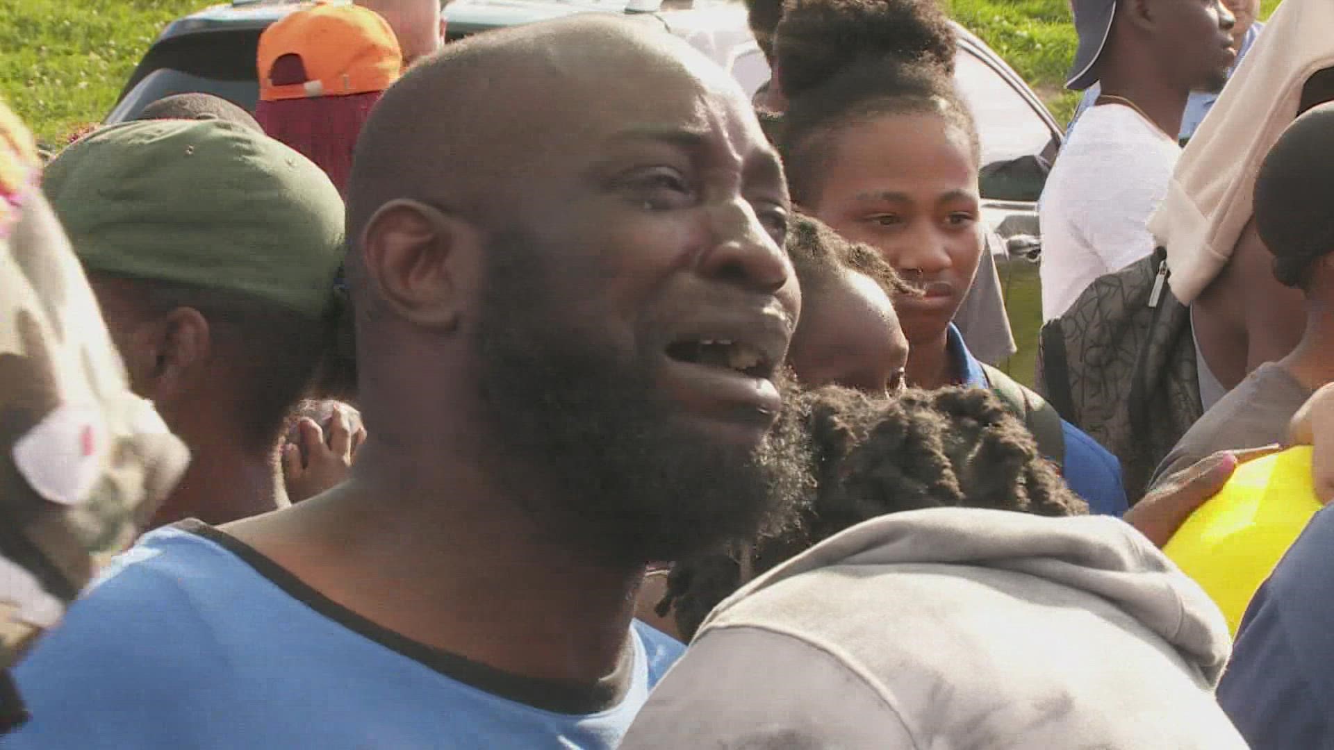 Allen Berry remembered his daughters as full of life Monday at a balloon release and vigil for them.