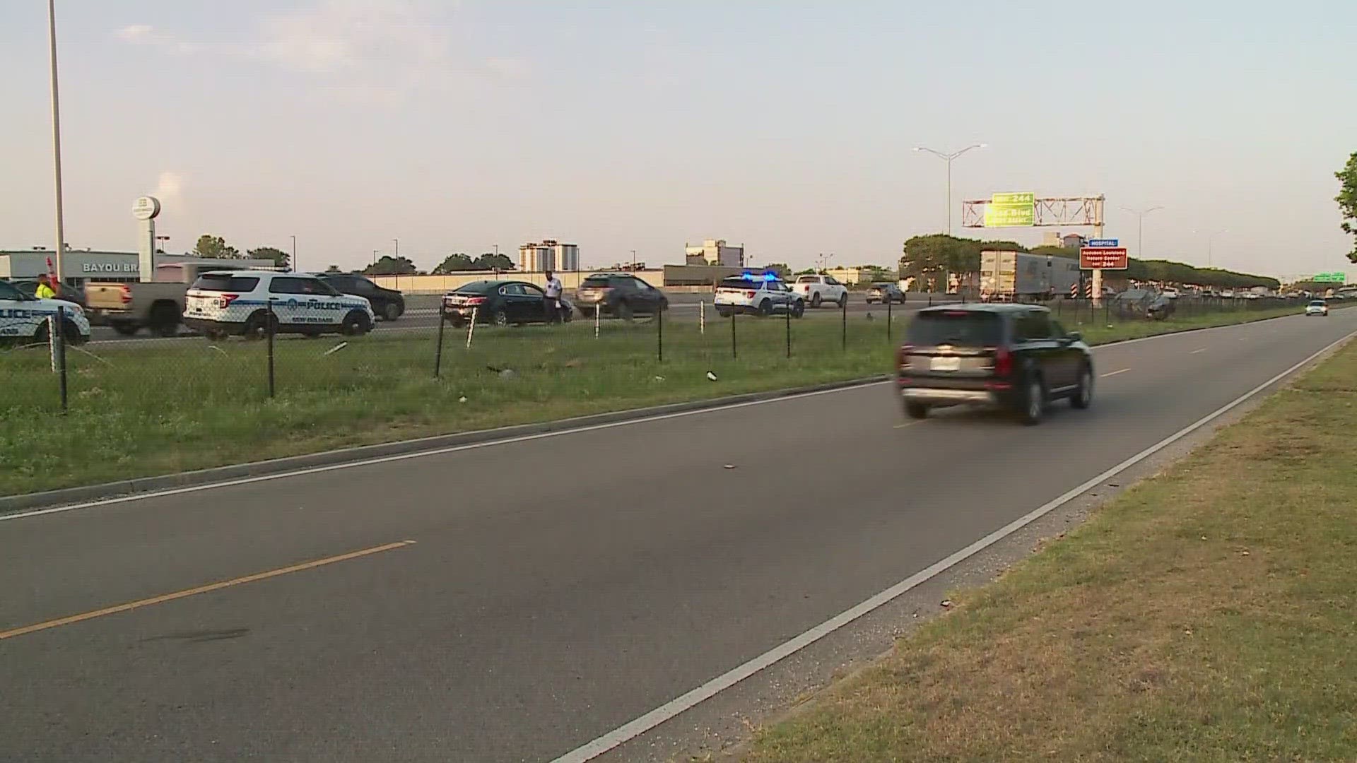 A woman was killed after her car hit the cable guardrail and flipped over.