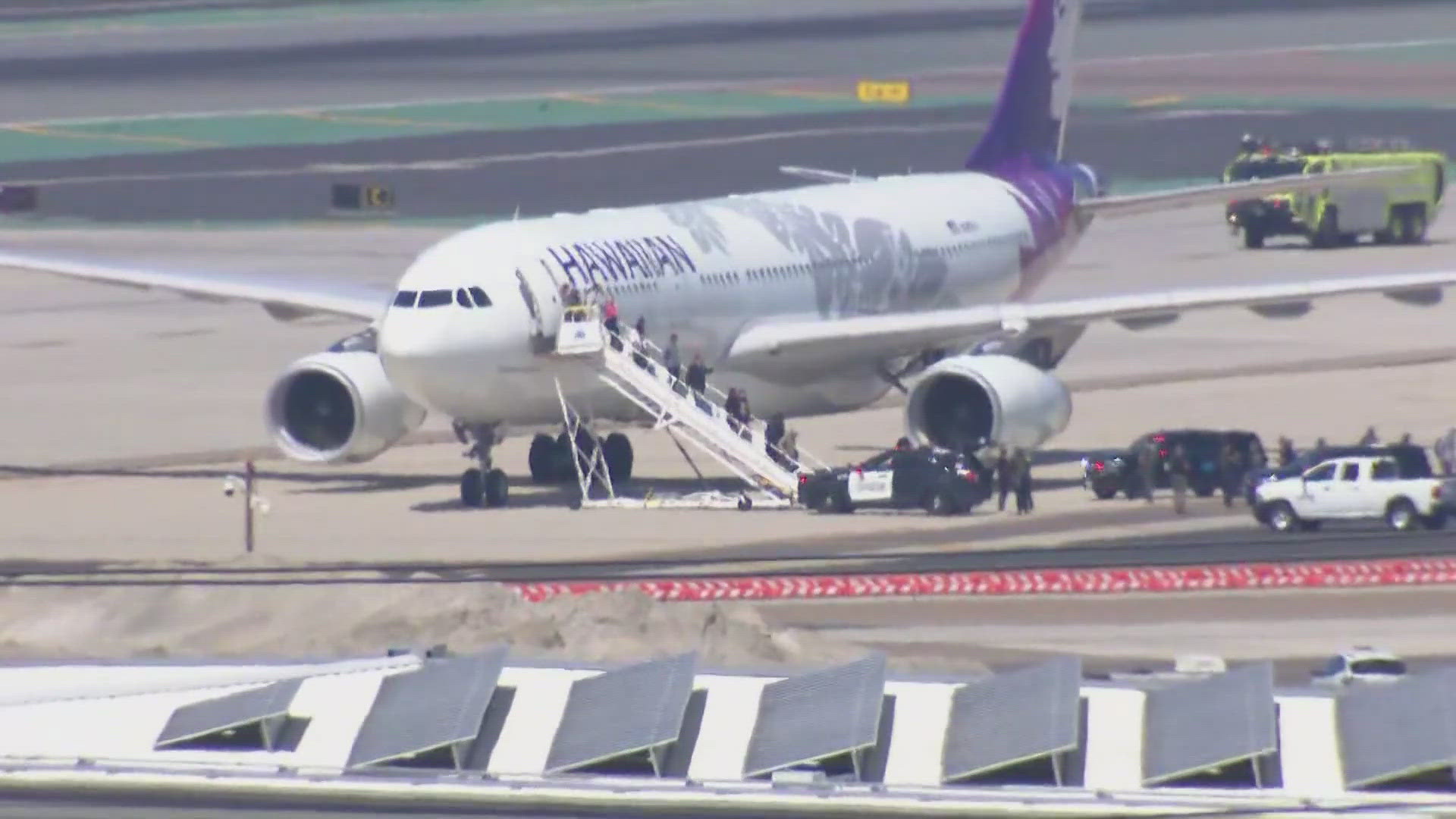 The flight was checked by K-9s, but there were no reports of a bomb being found on the plane.
