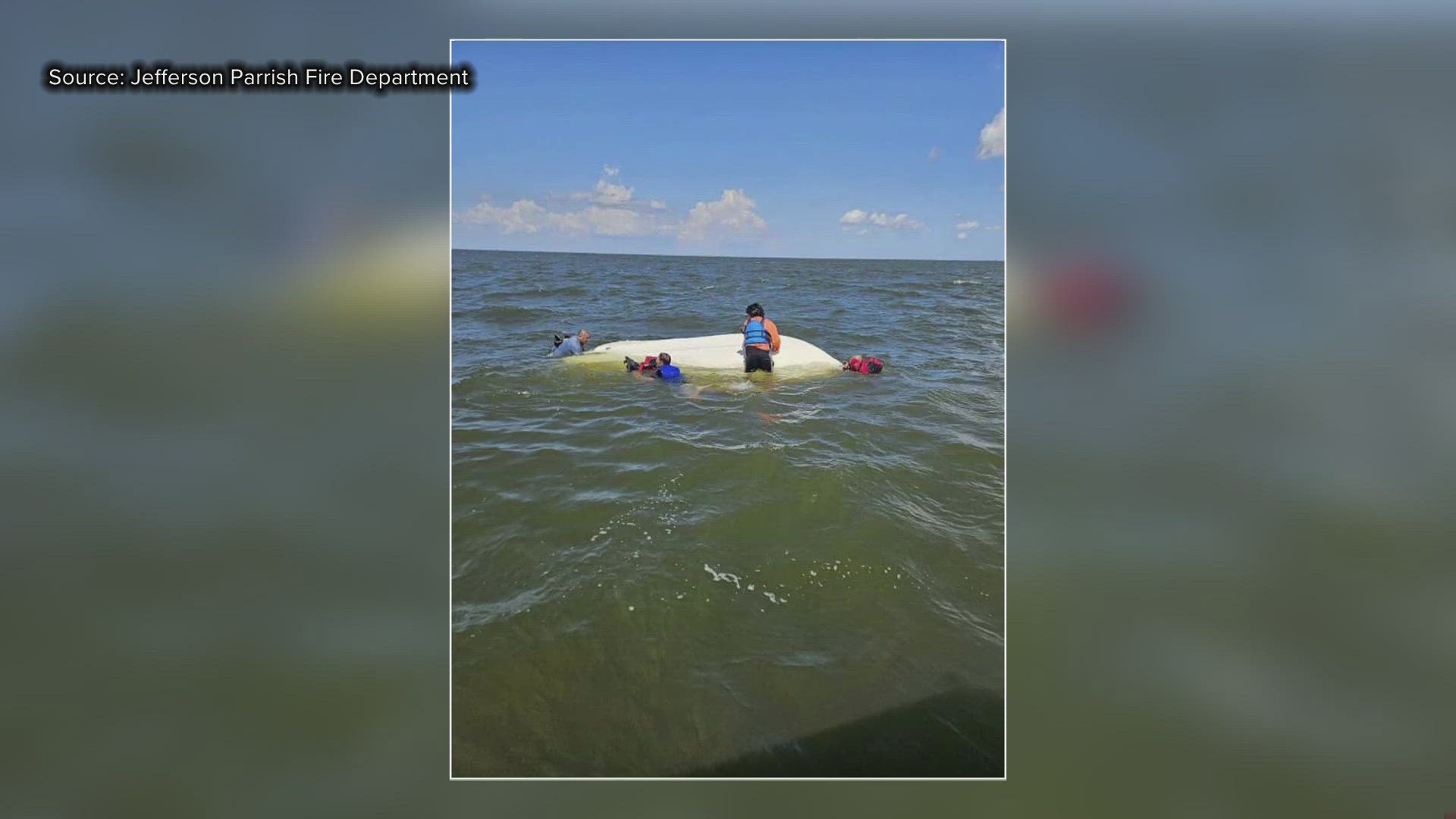 The four boaters were near the Causeway when their boat overturned. Firefighters commandeered a nearby family’s boat and pulled them out of the water.