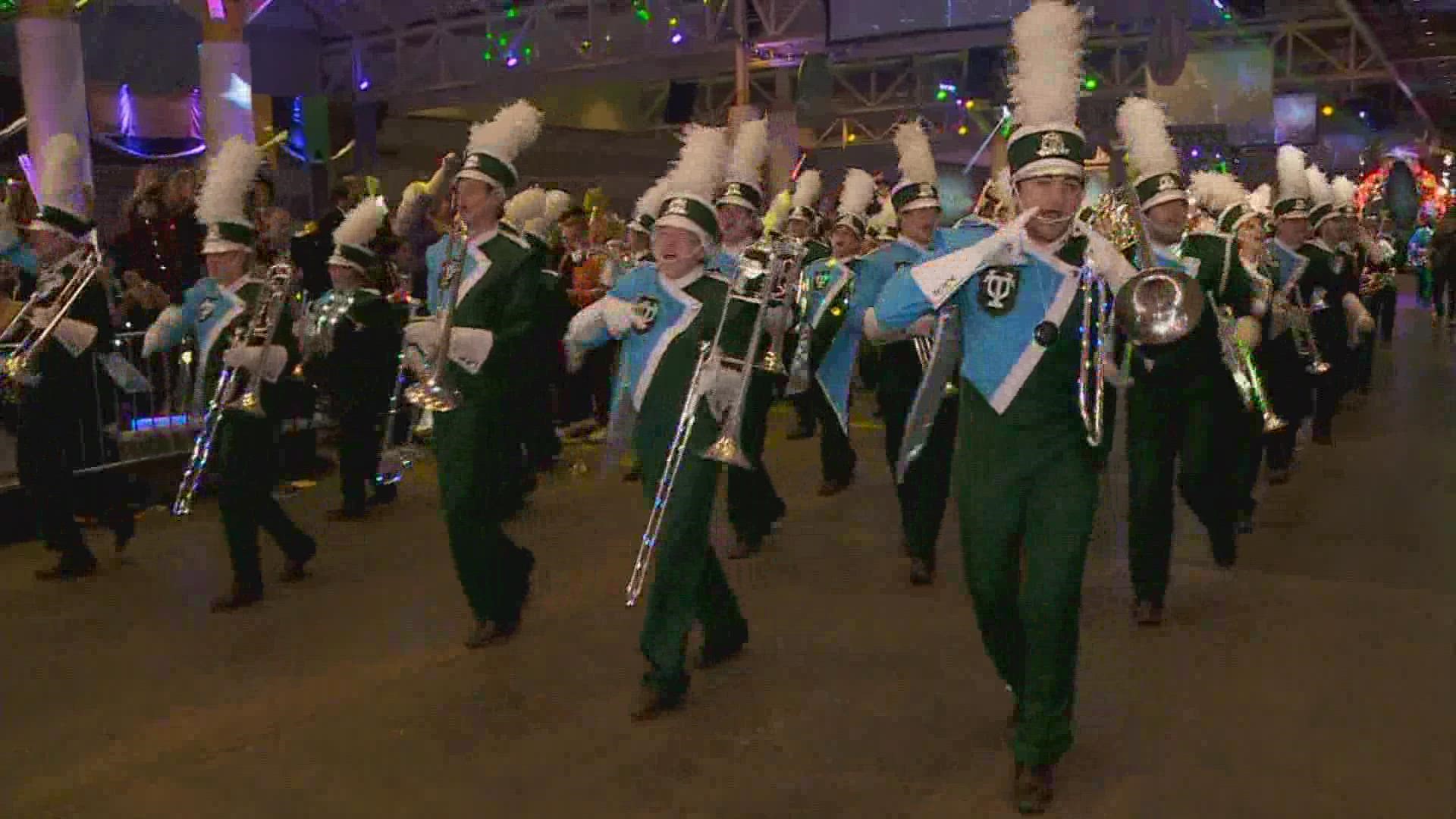 Tulane's Band marches on during the Krewe of Bacchus.