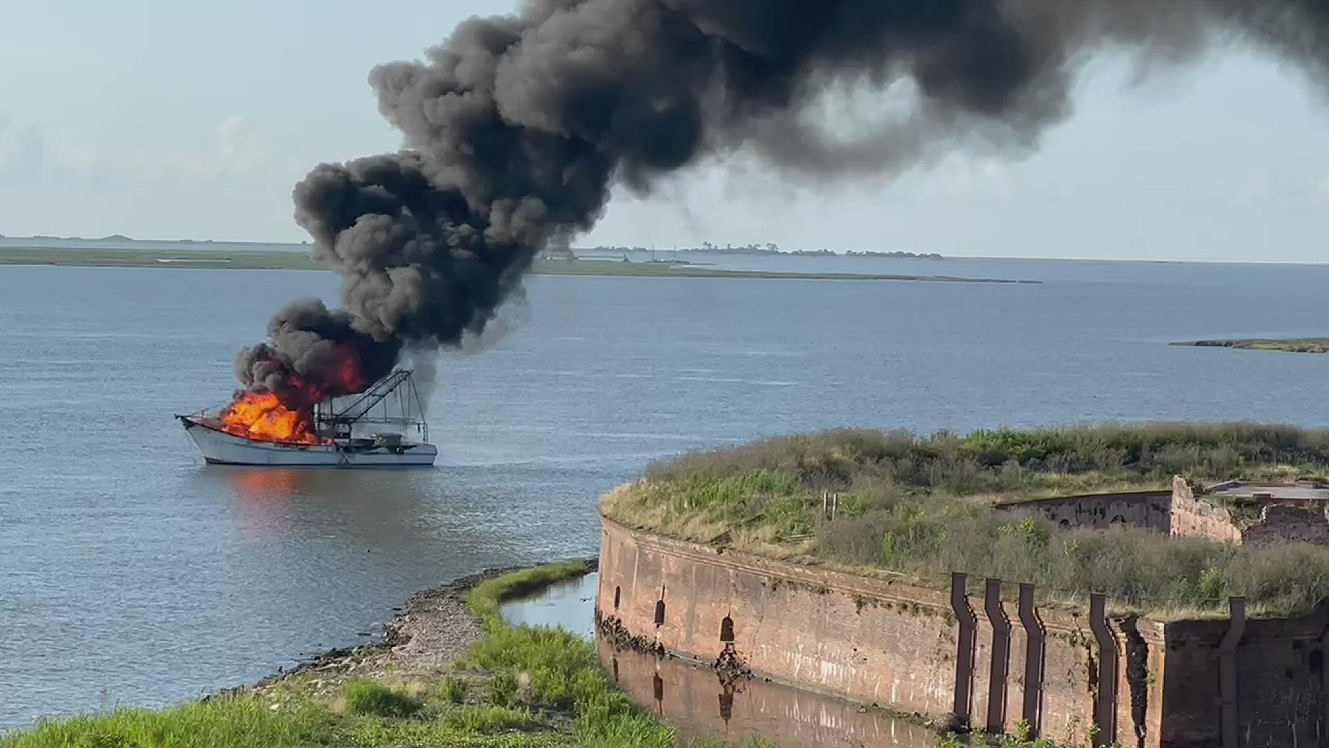 Shrimp boat engulfed in flames near Fort Pike