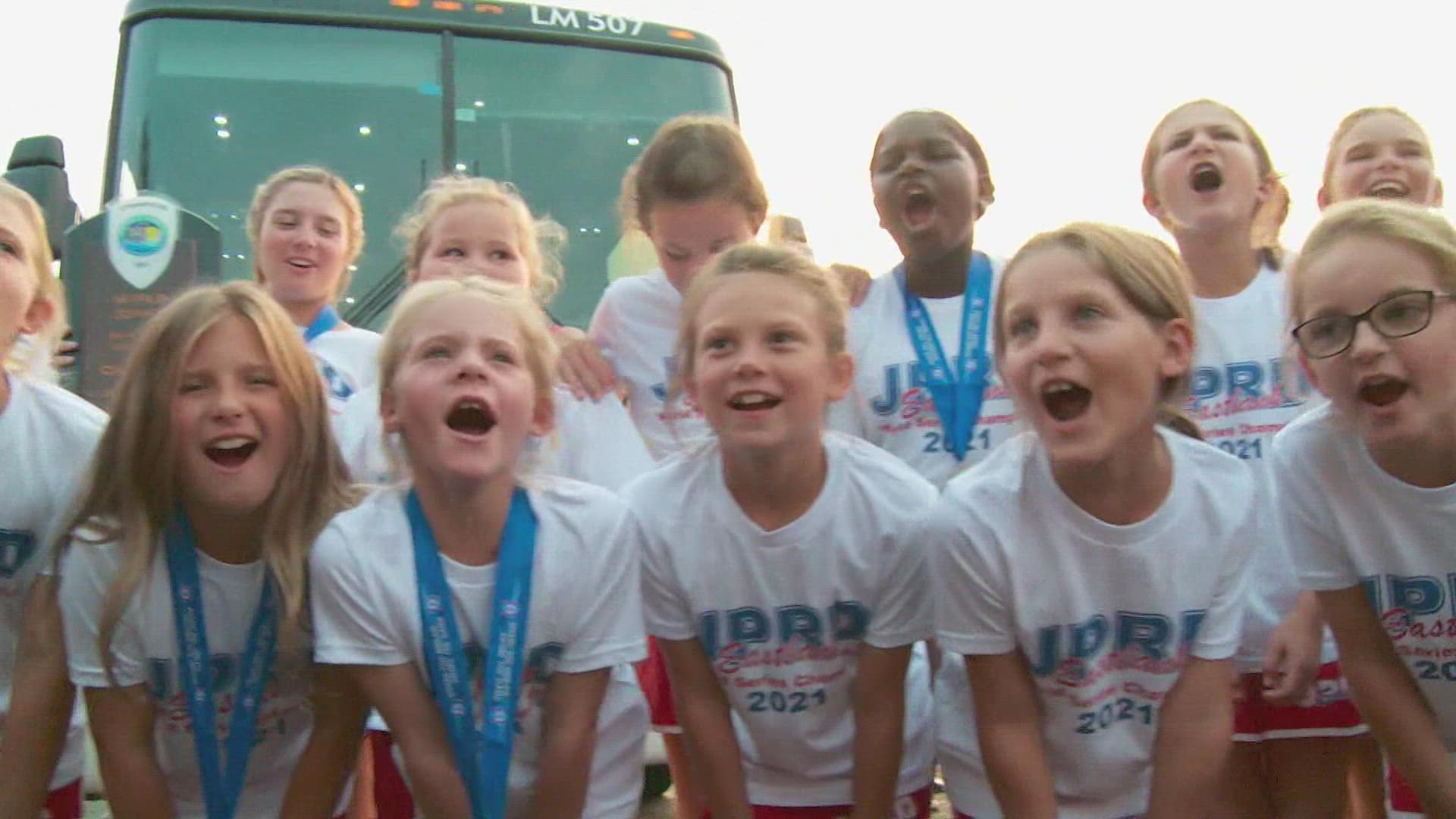 The JPRD "8 and under" girls softball team arrived home Thursday after winning the Babe Ruth World Series Wednesday in Florida.