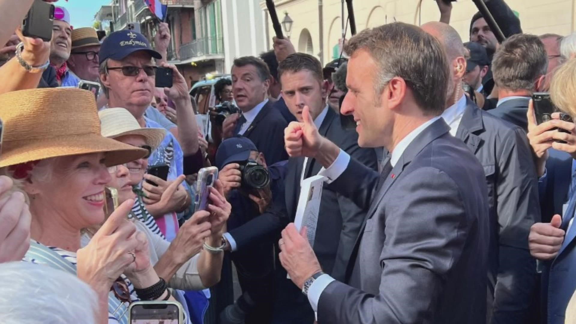 President Macron took extra time to stop and greet most of the people who lined the streets as he walked by.
