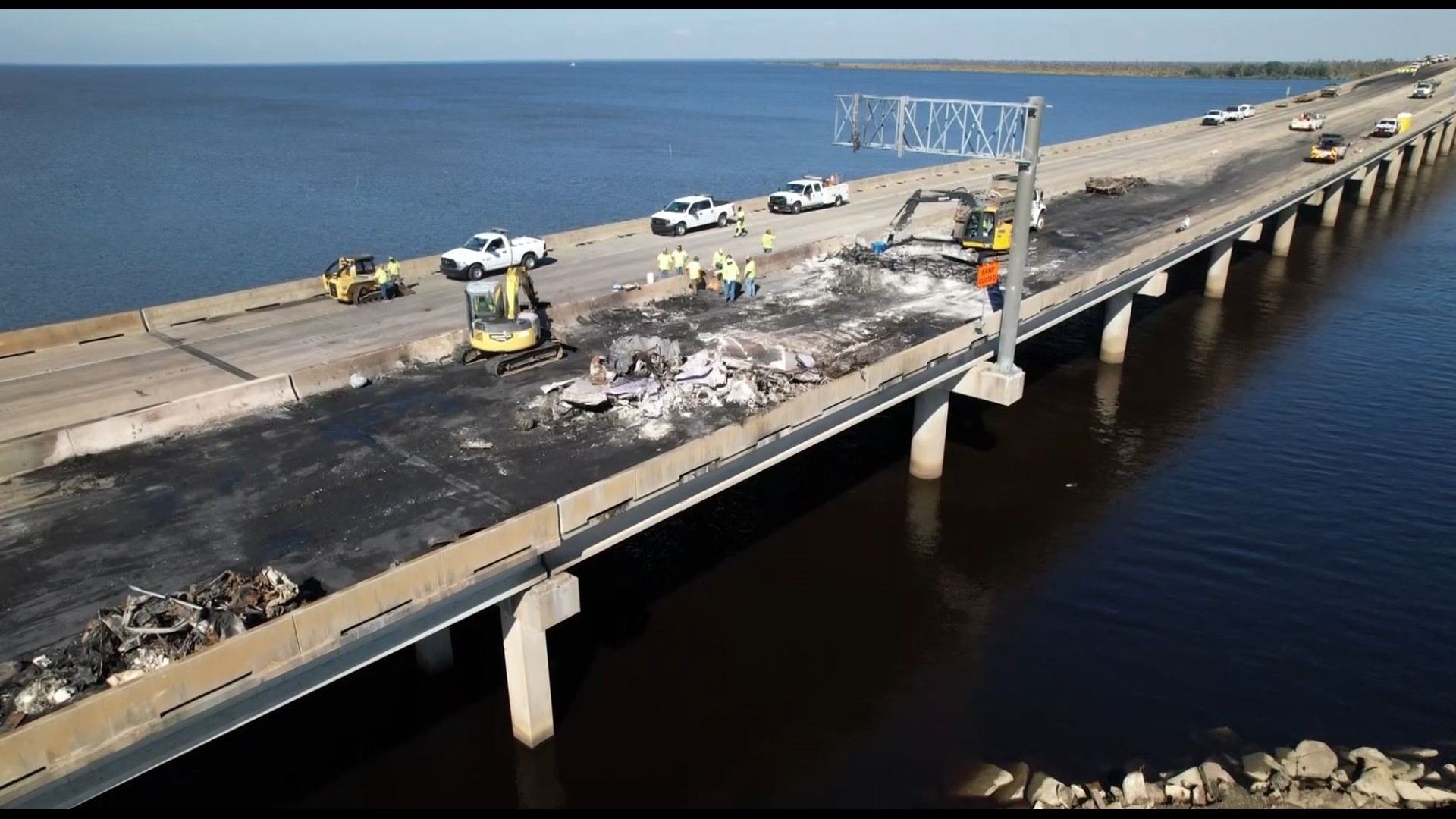 Drone video captures the cleanup effort after a fatal fiery multi-vehicle crash on I-55.