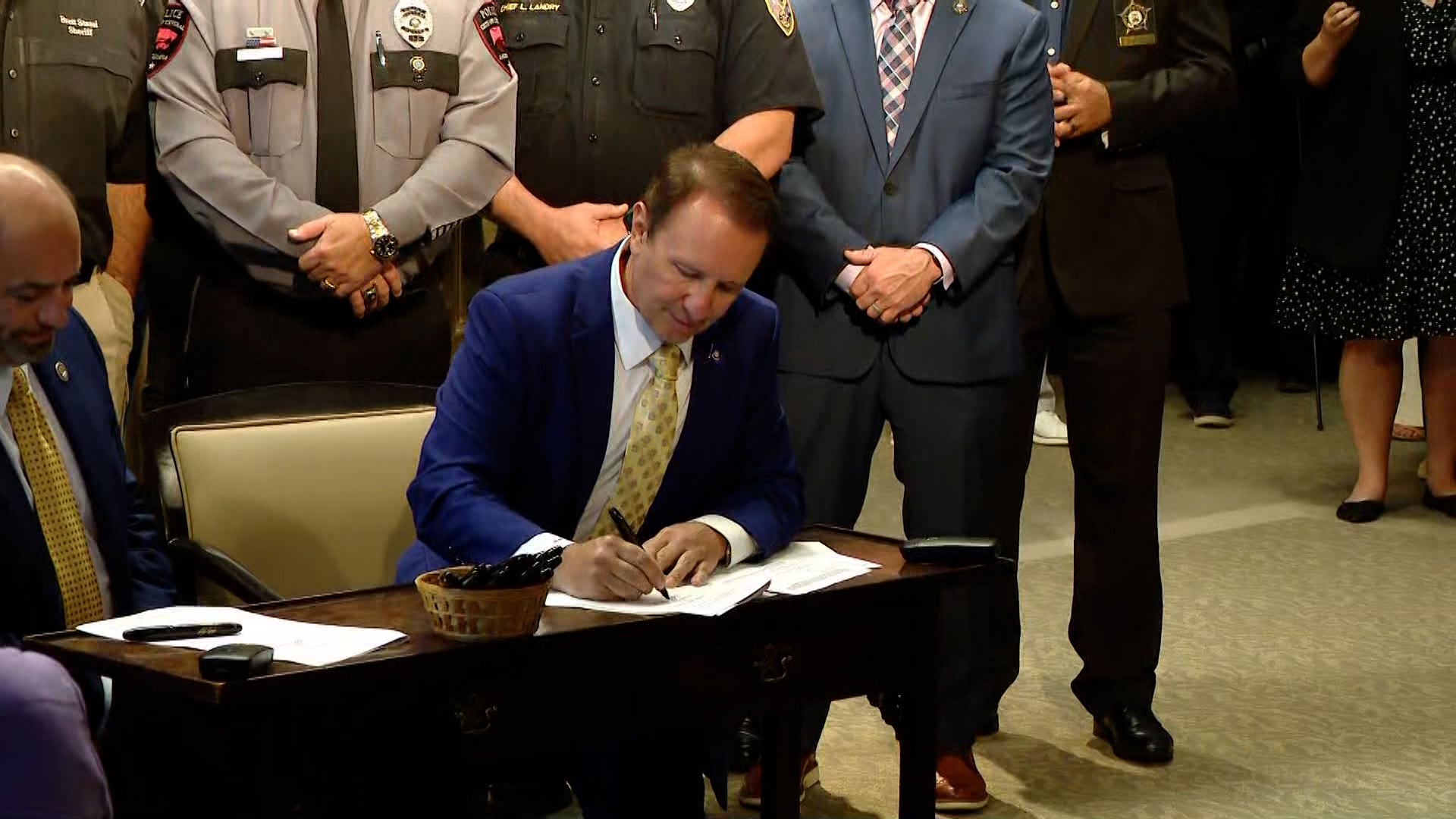 Gov. Landry signs House Bill No. 173 on Tuesday in Baton Rouge make coming within 25 feet of a police officer lawfully engaged in law enforcement duties a crime.