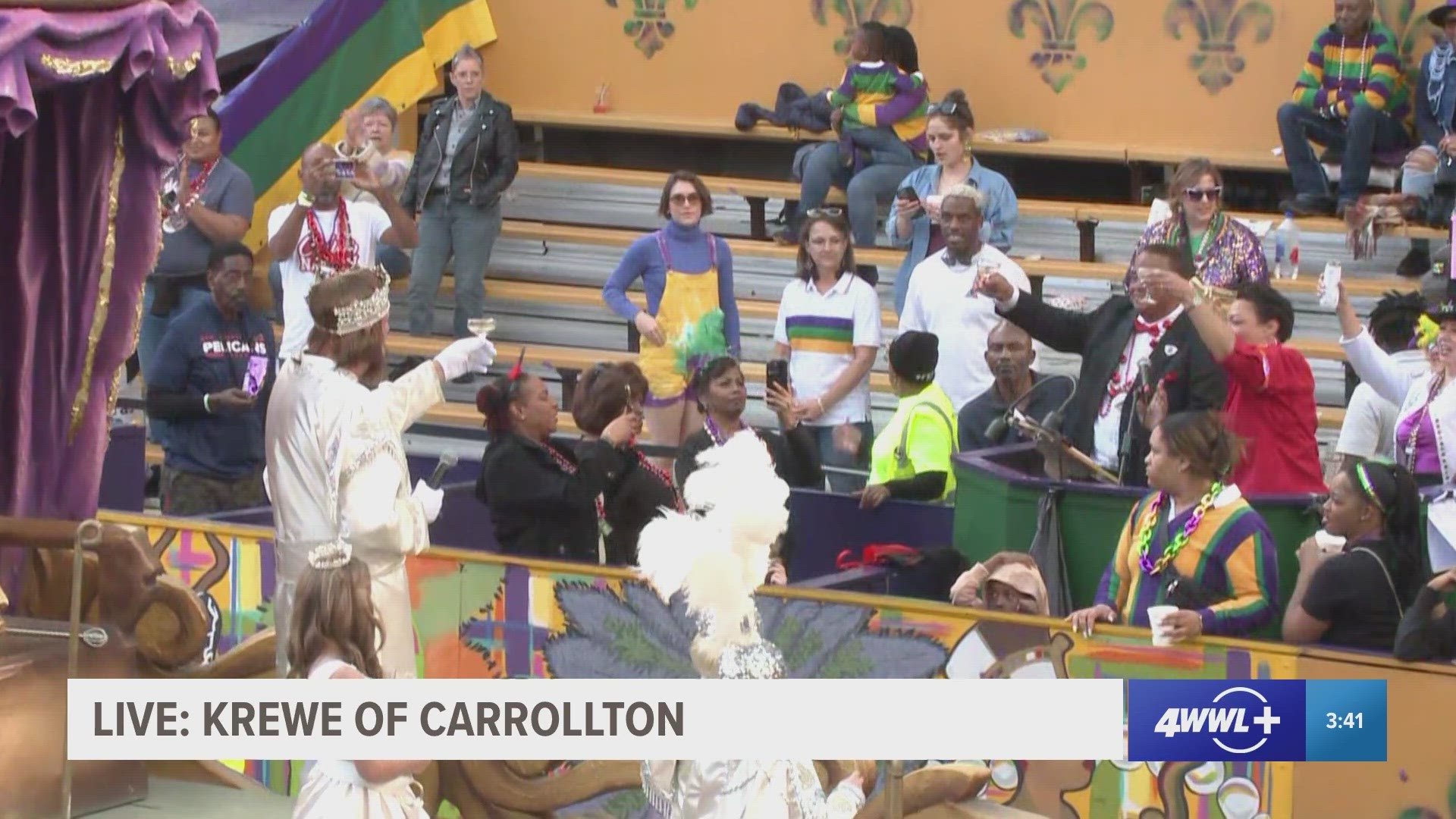 The King of Krewe of Carrollton toasts to 100 years of parade memories and Mayor Cantrell gifts him the key to New Orleans