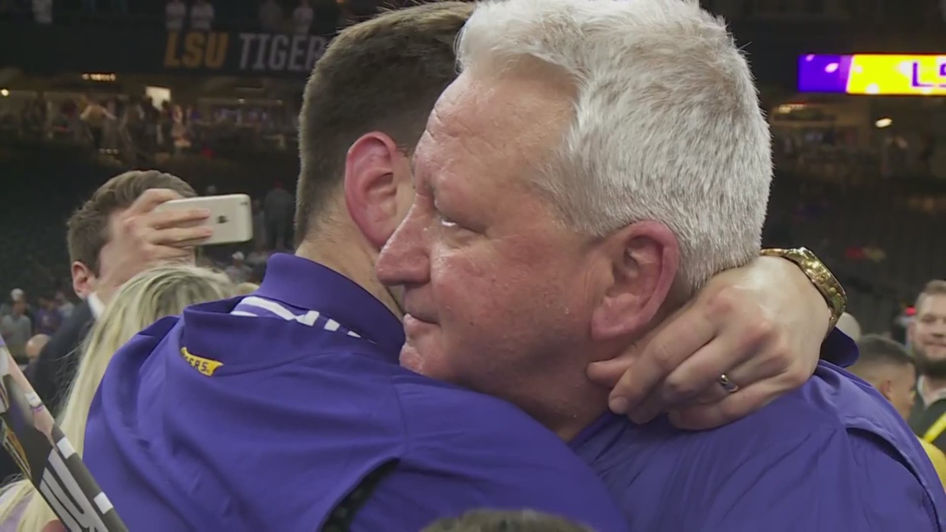 Family, the most important thing to anyone: LSU Offensive coordinator Steve Ensminger and his son, Steve Ensminger shared a moment after the LSU championship.