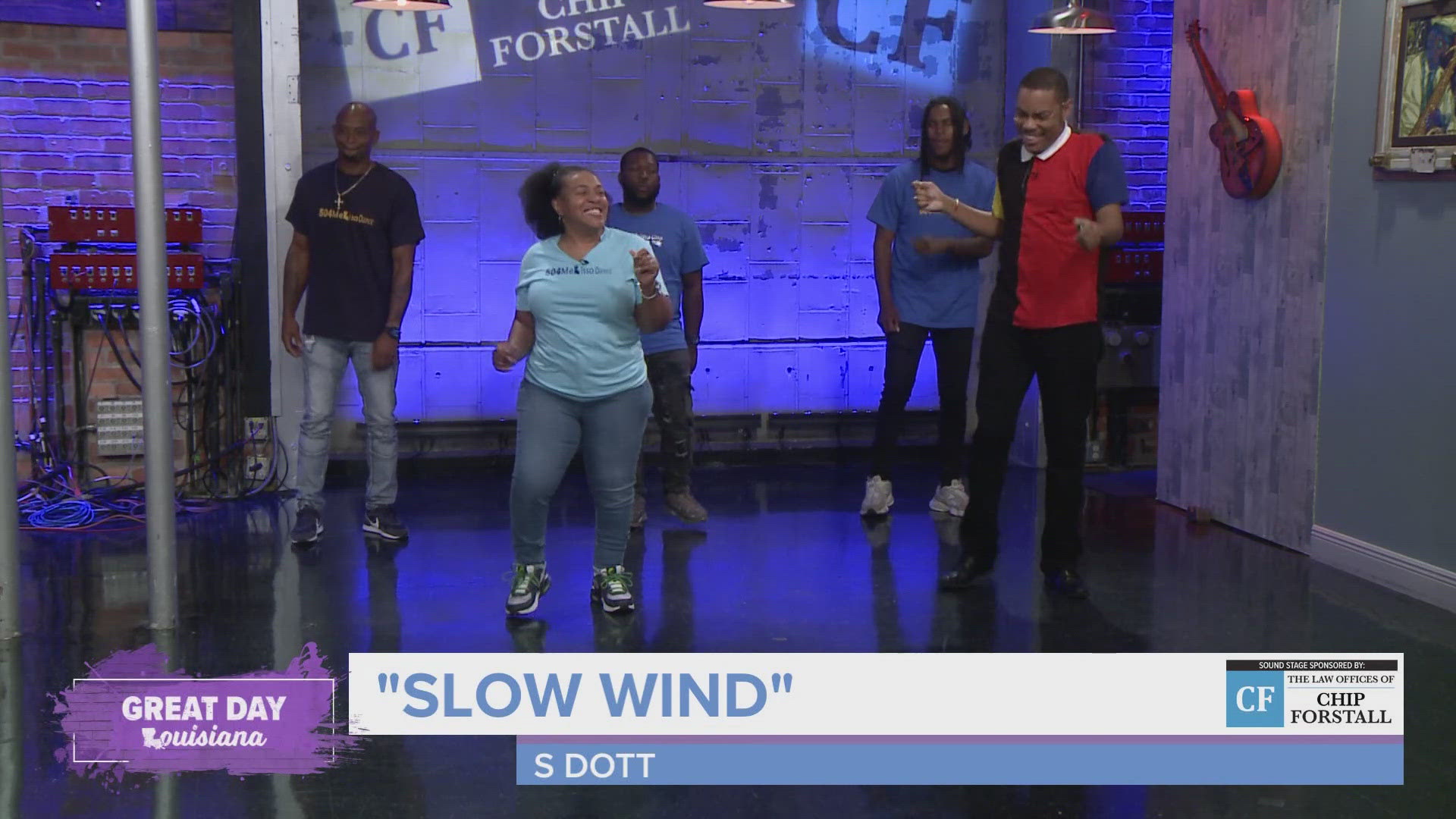 Malik & Melissa Jones show off the moves for the line dance to "Slow Wind."