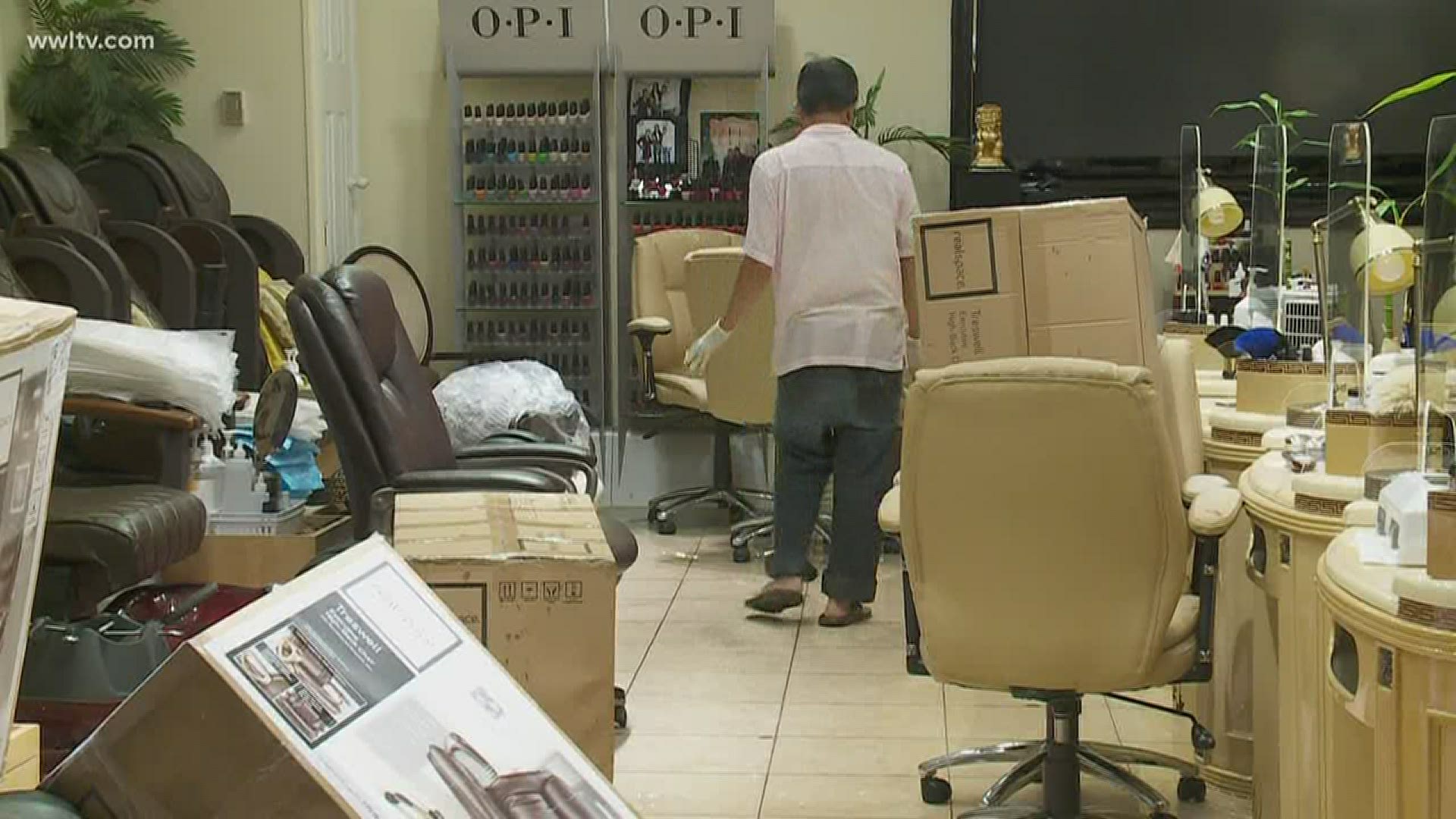 After working all day to make sure they'd be ready for Phase 1 of Louisiana's reopening, heavy rain flooded some businesses in Mandeville.