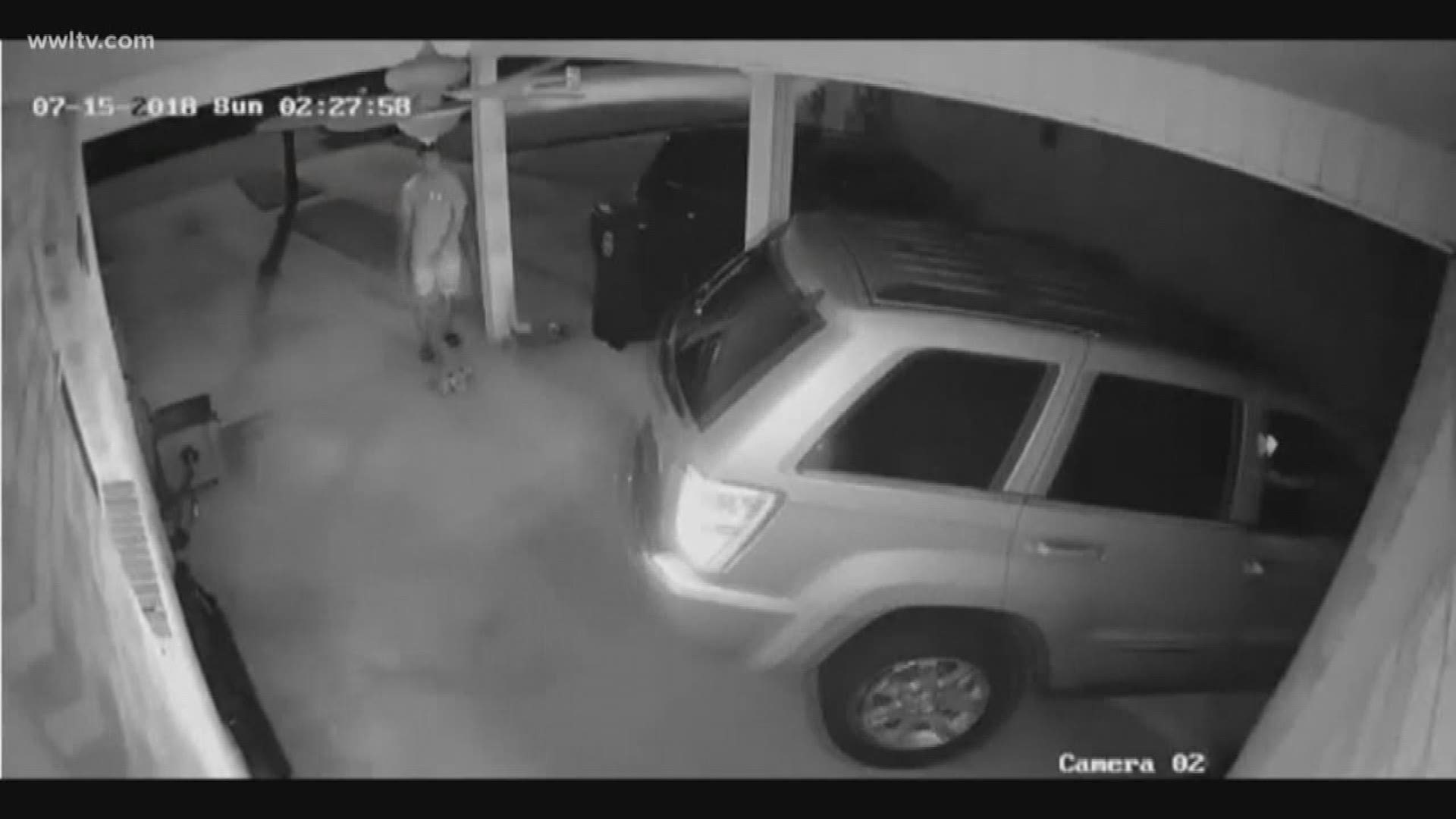Two men can be seen on surveillance video trying to wedge their way out of the homeowners driveway in the car for several minutes before taking off. 