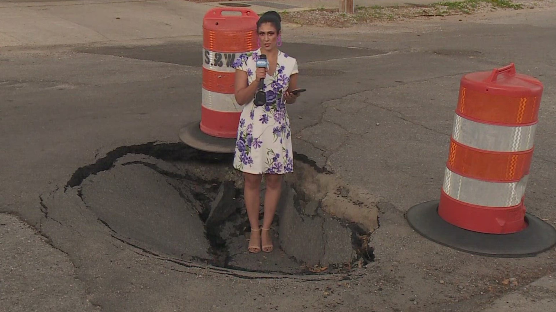 Baudin Street and Carrolton Avenue in Mid-City, two gaping holes appeared this week and residents have had to barricade them off to keep people safe.