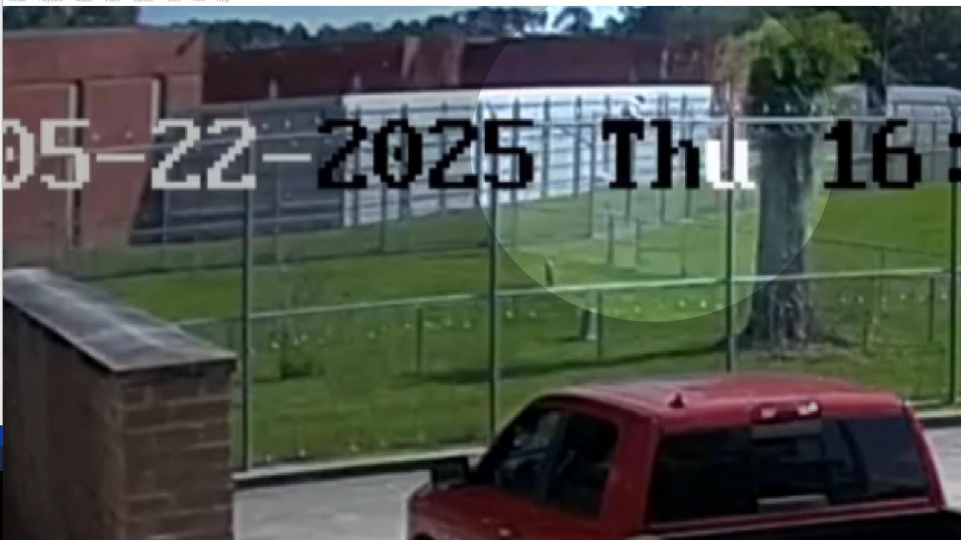 The video shows a man believed to be Tra’Von Johnson, 22 approaching the gate and signaling another inmate for help.