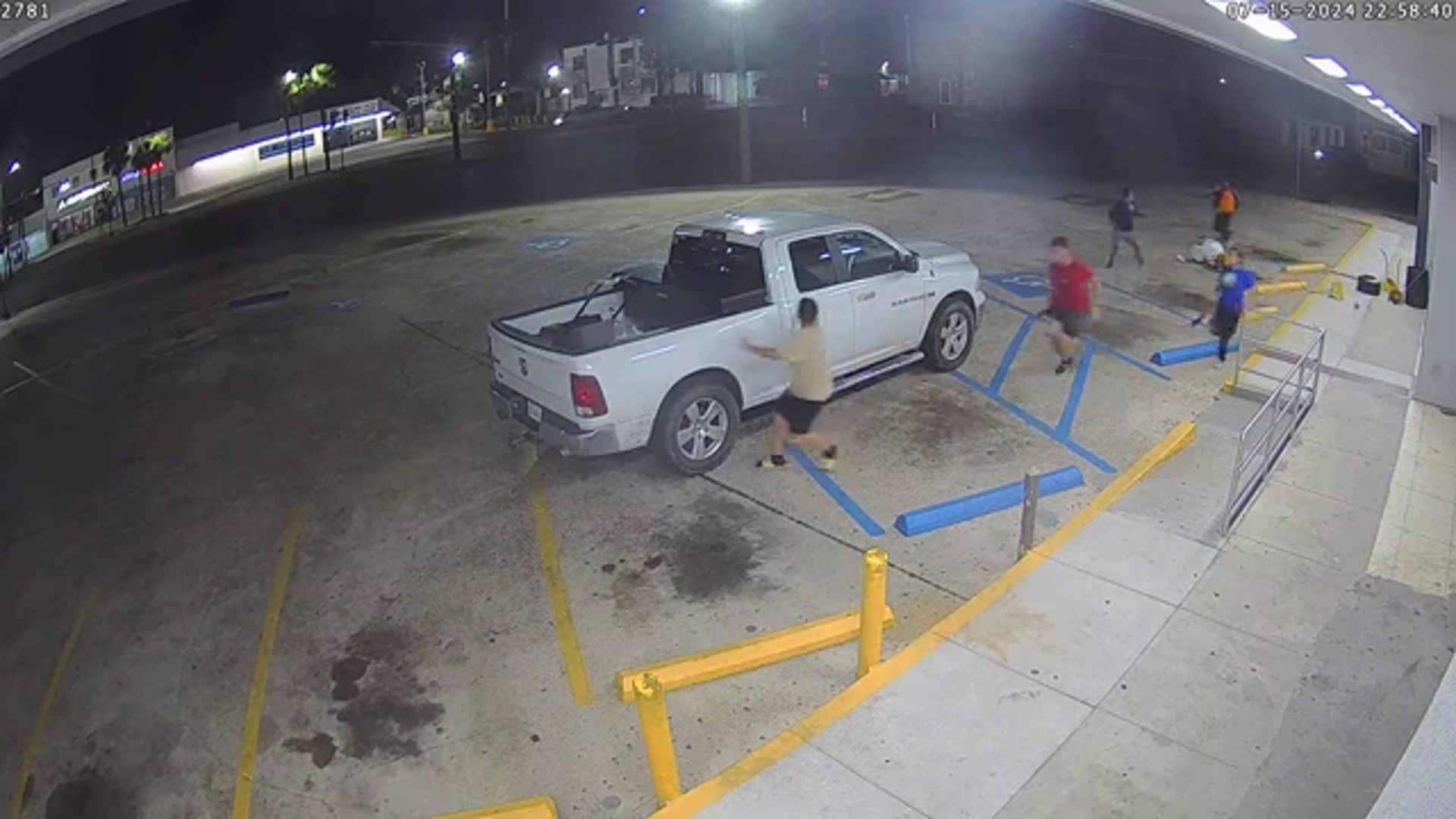 A cleaning crew sweeping the parking lot of a Gentilly Shopping Center was shot at and was caught on security camera video.