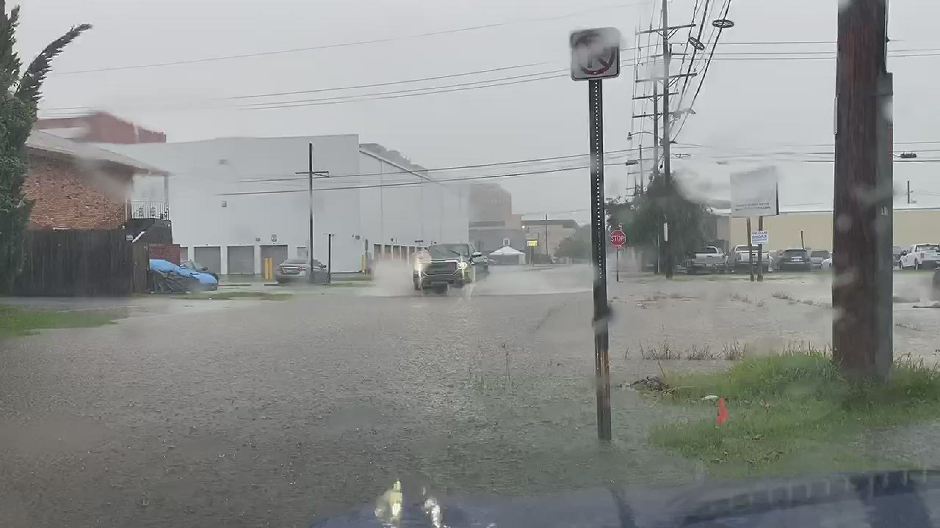 Sustained downpours during the Wednesday morning commute have caused multiple streets to flood around the city and prompted a flash flood warning.