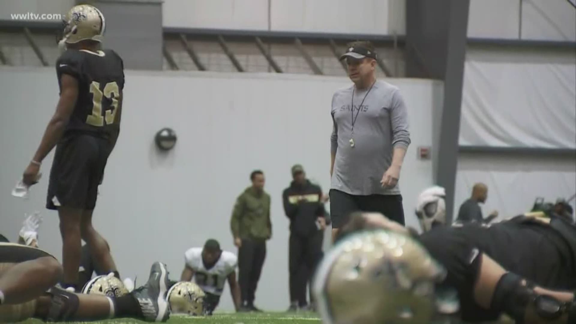 At Saints practice Wednesday, Coach Sean Payton drove onto the field in a cart filled with $225,000 in $1 bills and the Lombardi Superbowl trophy.